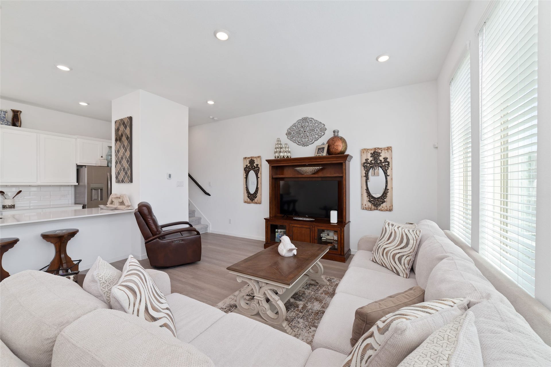 5715 Foggy Vine Court, Fulshear, TX 77441 Another perspective of the family room showcases its generous dimensions, comfortable seating possibilities, and bright, airy atmosphere.