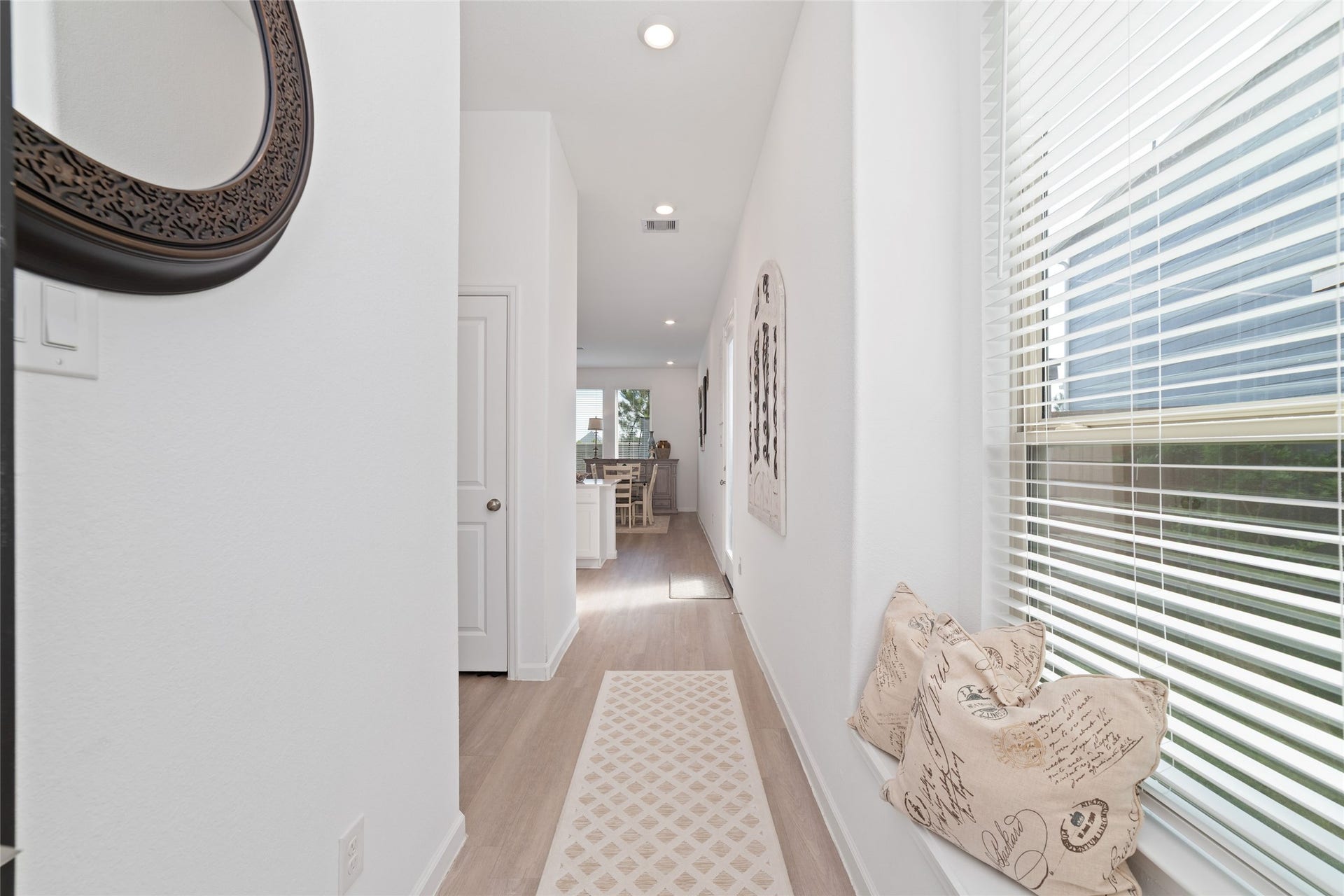 5715 Foggy Vine Court, Fulshear, TX 77441 Step inside to a bright, inviting entryway featuring neutral finishes, natural light, and a welcoming atmosphere that flows into the main living areas.