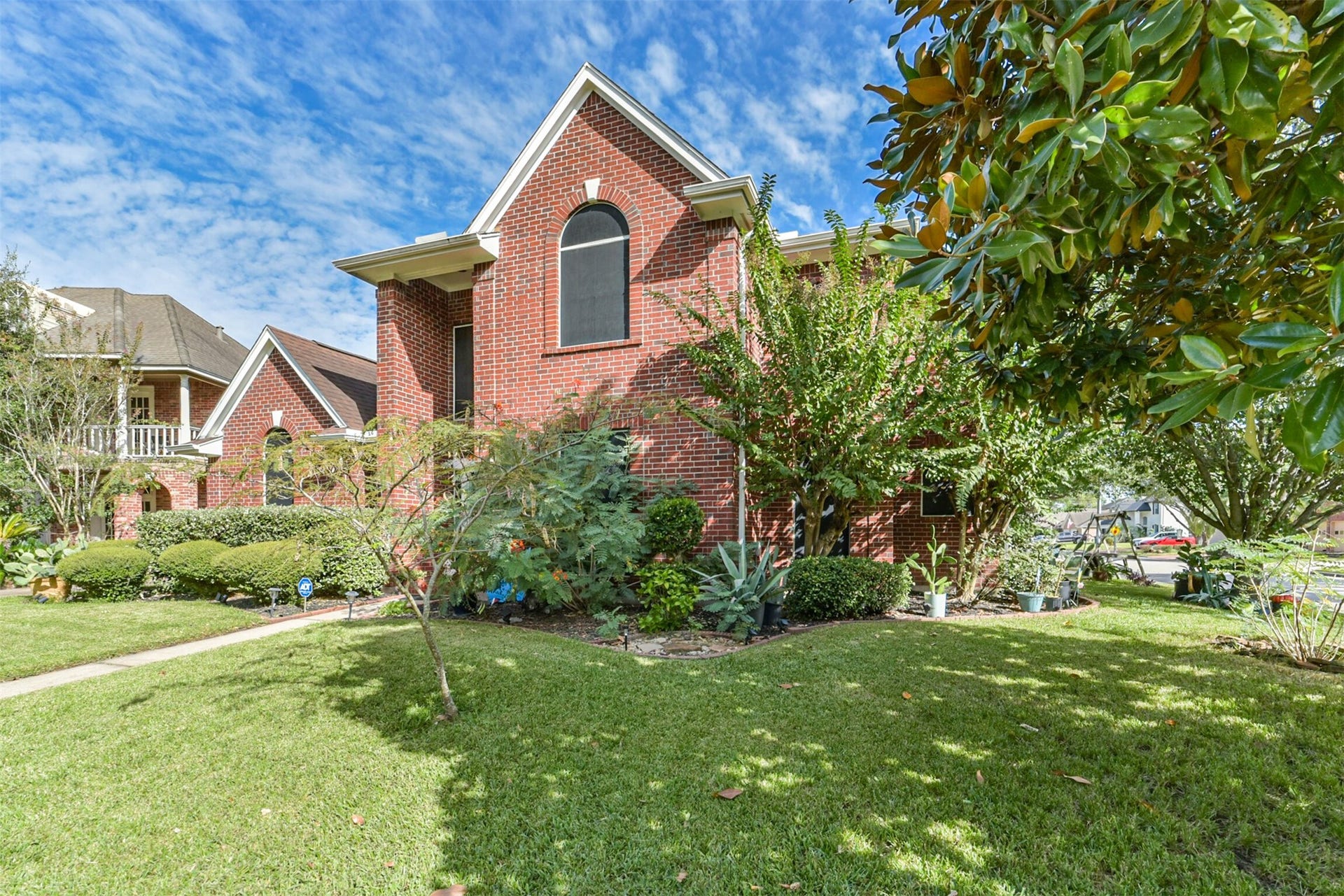 18402 Spinner Court Drive, Humble, TX 77346 A view of the home from the right corner
