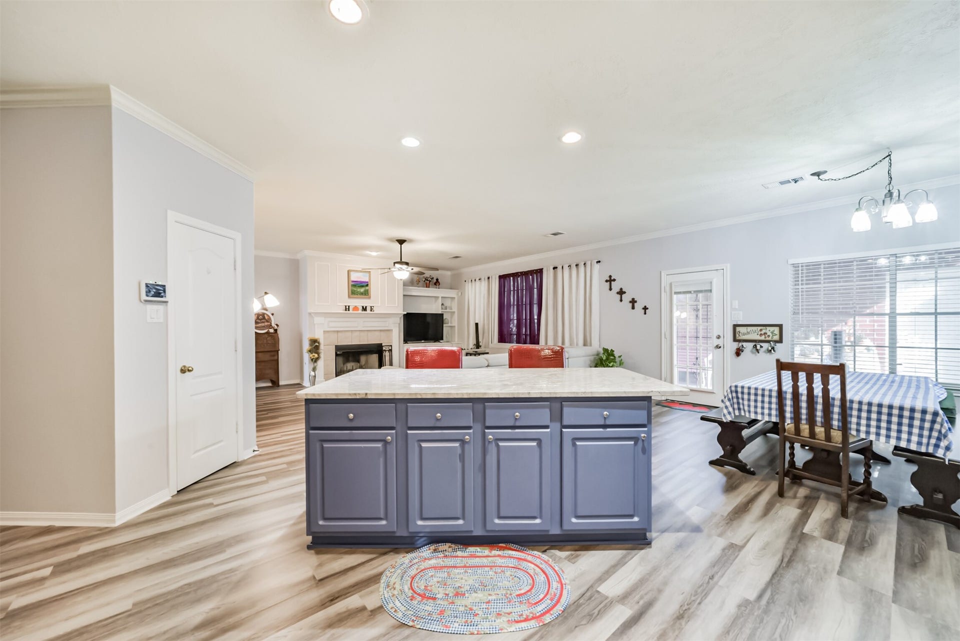 18402 Spinner Court Drive, Humble, TX 77346 A center island with built-in drawers and cabinets provides additional storage space.