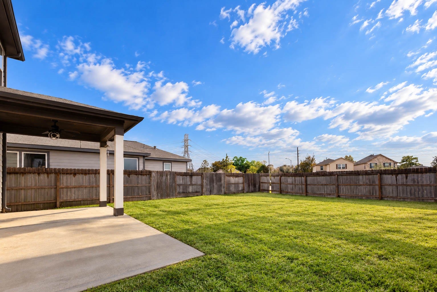 6131 Morning Fern Lane, Humble, TX 77338 Imagine relaxing beneath the covered patio while overlooking the spacious, fully fenced backyard! Complete with a ceiling fan & an extended concrete pad, this patio offers a wonderful setting for morning coffee, weekend barbecues, or simply enjoying the outdoors.