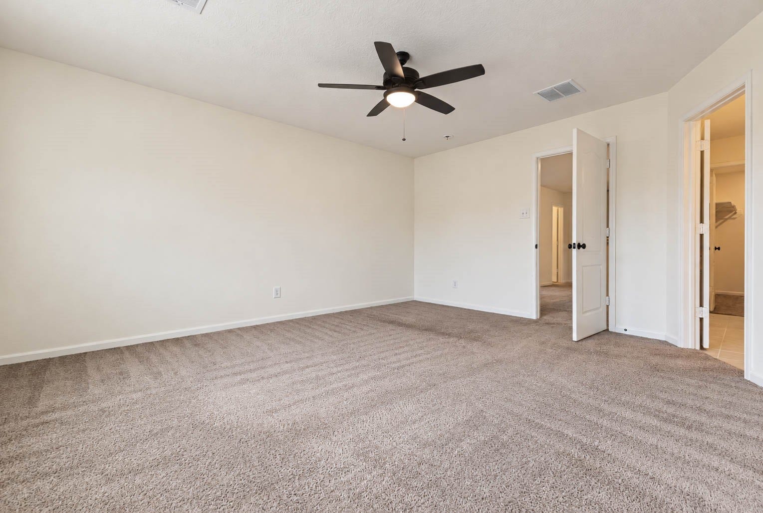 6131 Morning Fern Lane, Humble, TX 77338 The generously sized layout offers plenty of room for a luxurious bedroom arrangement, along with additional space for a cozy sitting area or private reading nook, creating the perfect place to unwind at the end of the day.