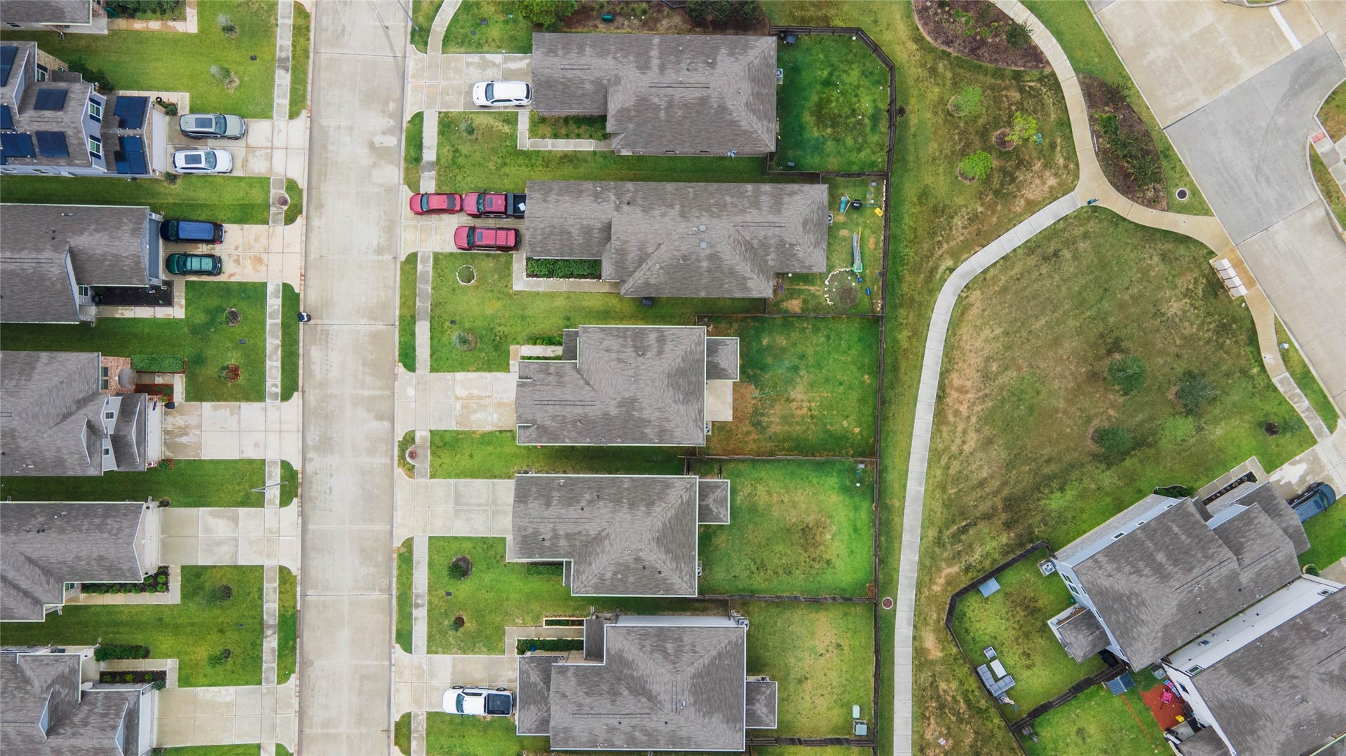 6131 Morning Fern Lane, Humble, TX 77338 This beautiful home offers a private backyard, offering a serene outdoor retreat with the added benefit of having no rear neighbors, ensuring maximum tranquility. The paved walkway behind the home leads to the playground!