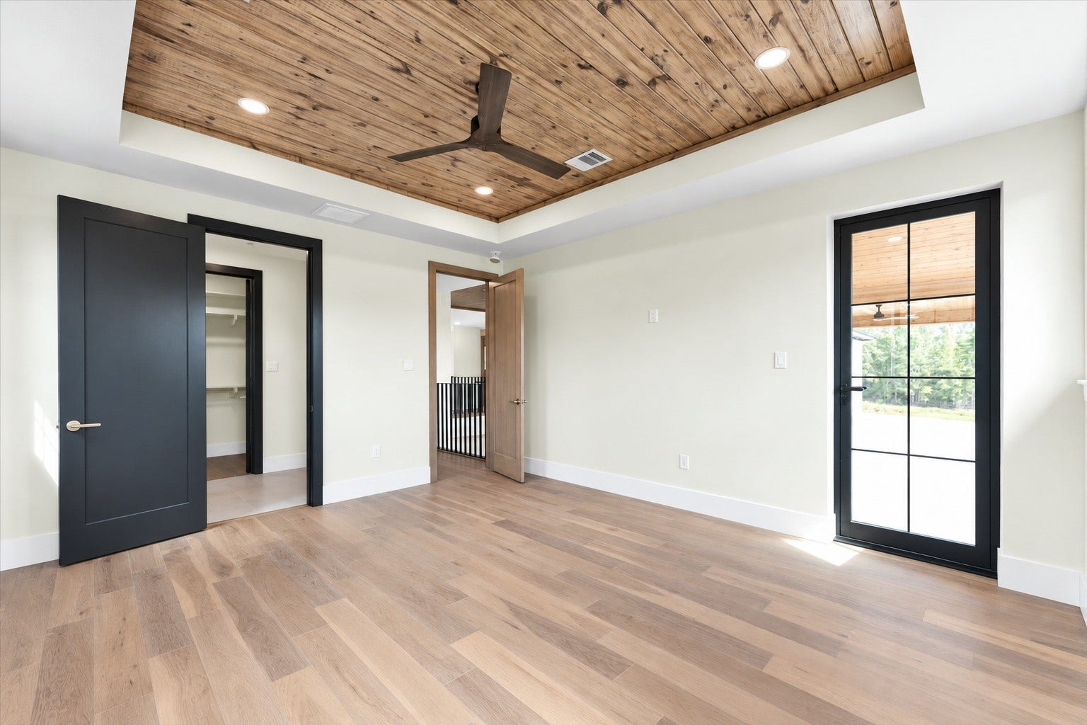 23701 Birch Grove Road, Montgomery, TX 77316 The fourth bedroom offers seamless access to a private balcony, perfect for enjoying serene views and fresh air.
