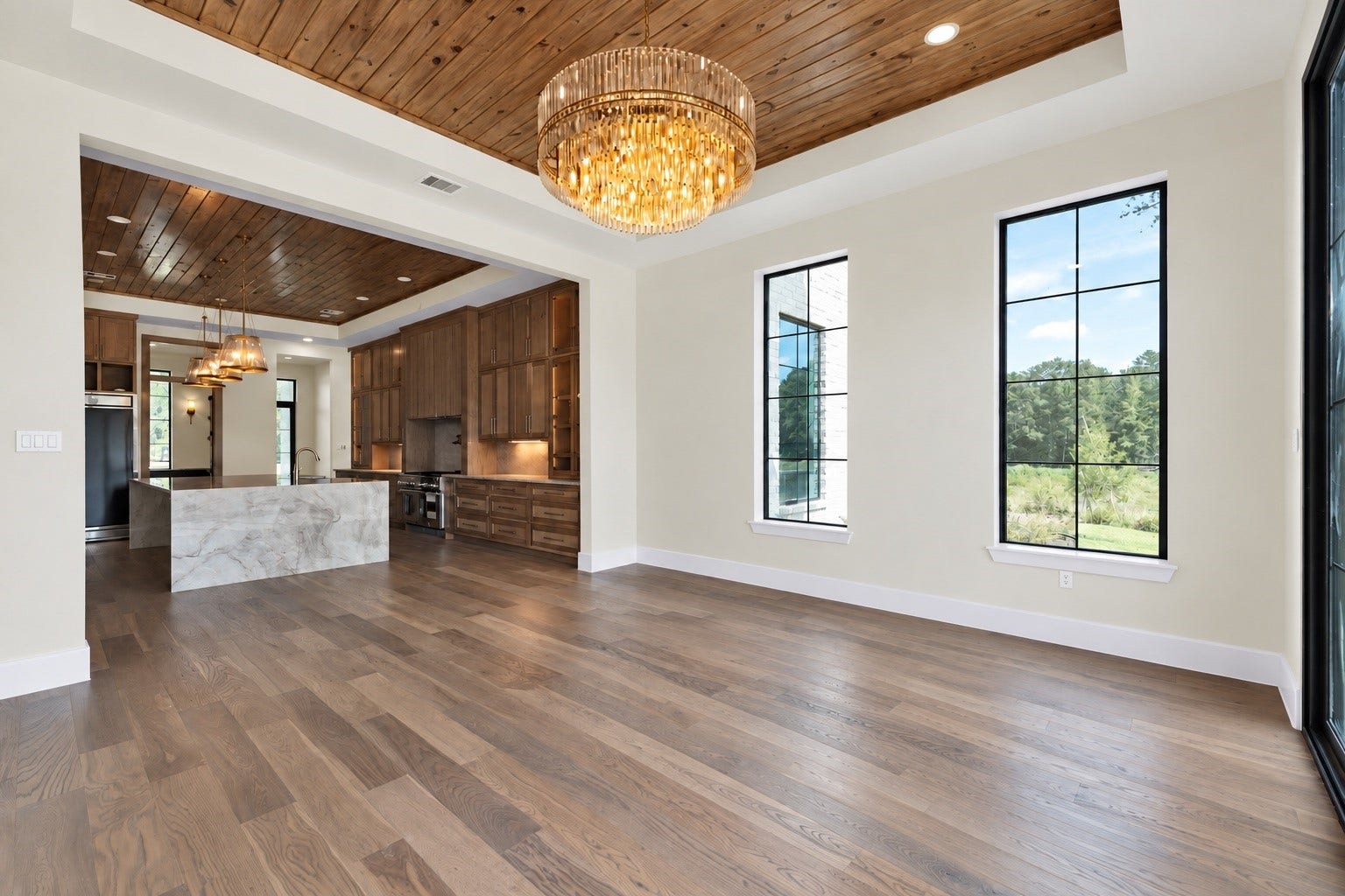 23701 Birch Grove Road, Montgomery, TX 77316 Experience tranquil dining with double windows and a sliding door that opens to a serene patio with picturesque pond views.