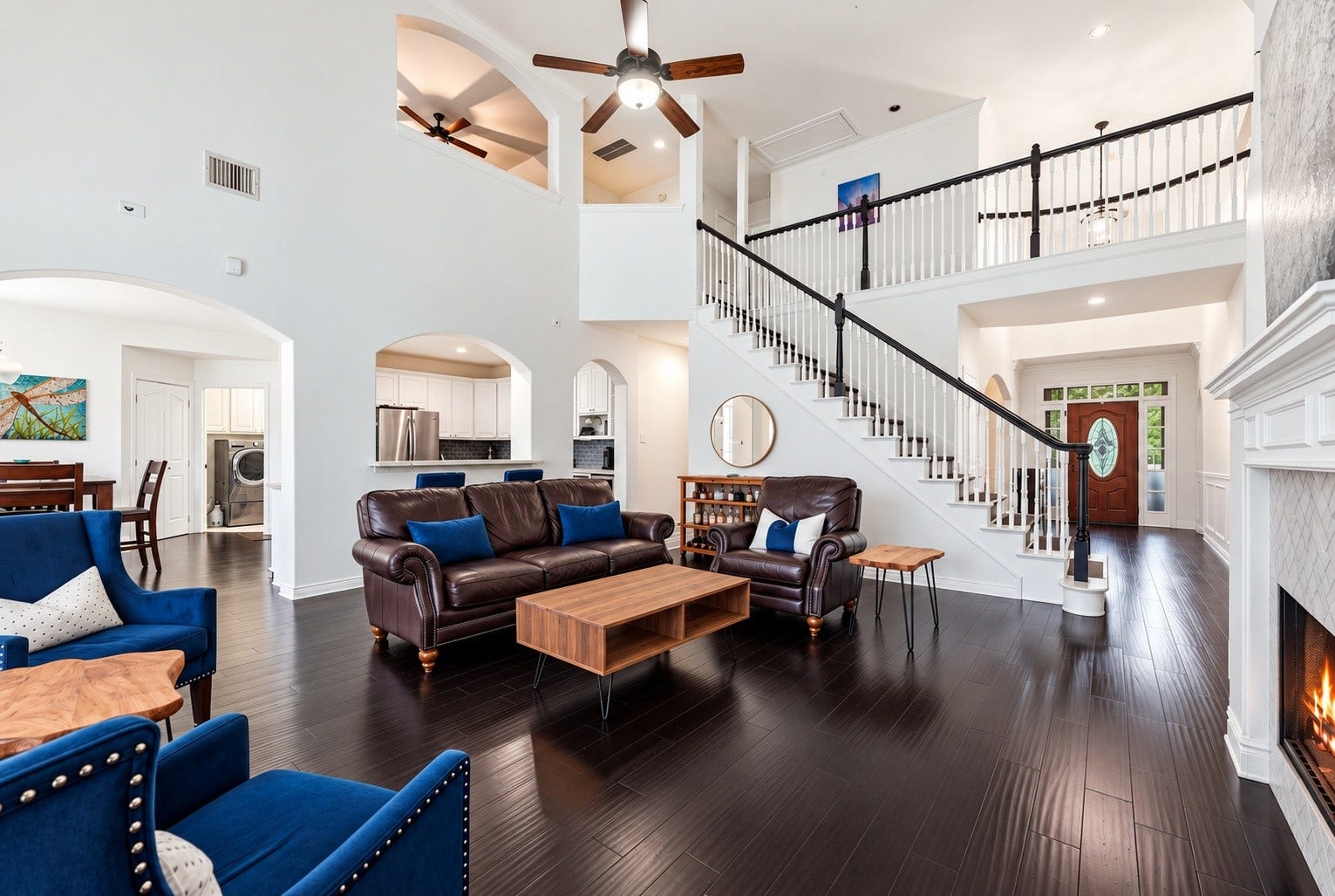 Open concept.  Views of living, front entry, breakfast area, kitchen, and upstairs open to below.