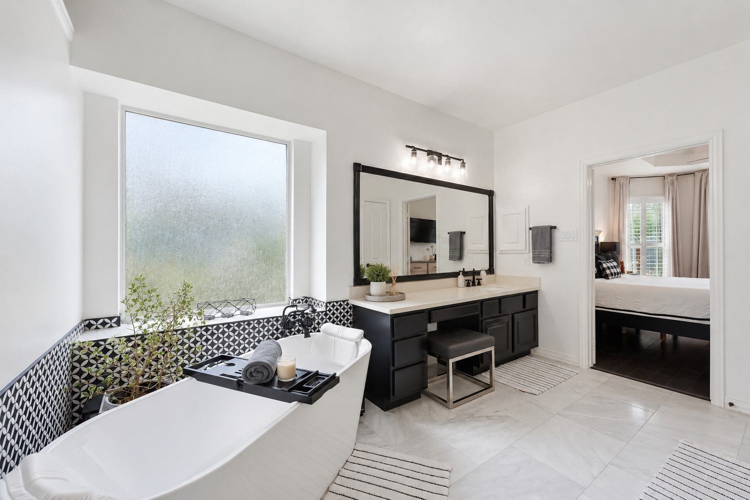 Look at this gorgeous soak in tub!  This bathroom has been lightly digitally staged.