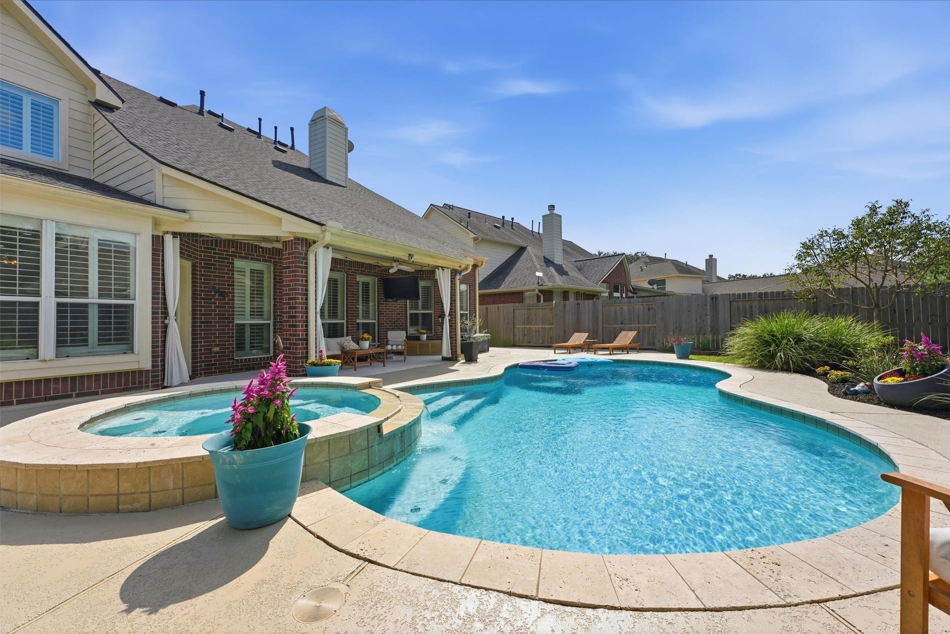 New and fresh landscaping around pool