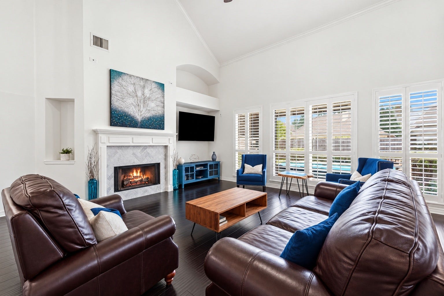 Downstairs living room with views of the pool