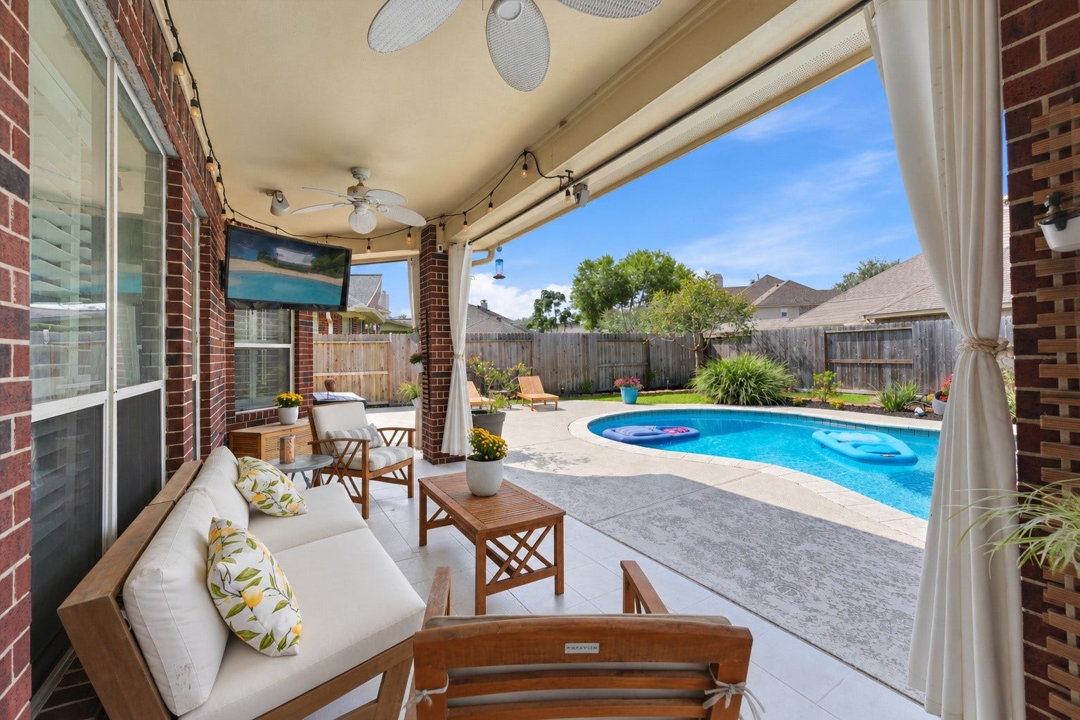 Covered patio overlooking the pool