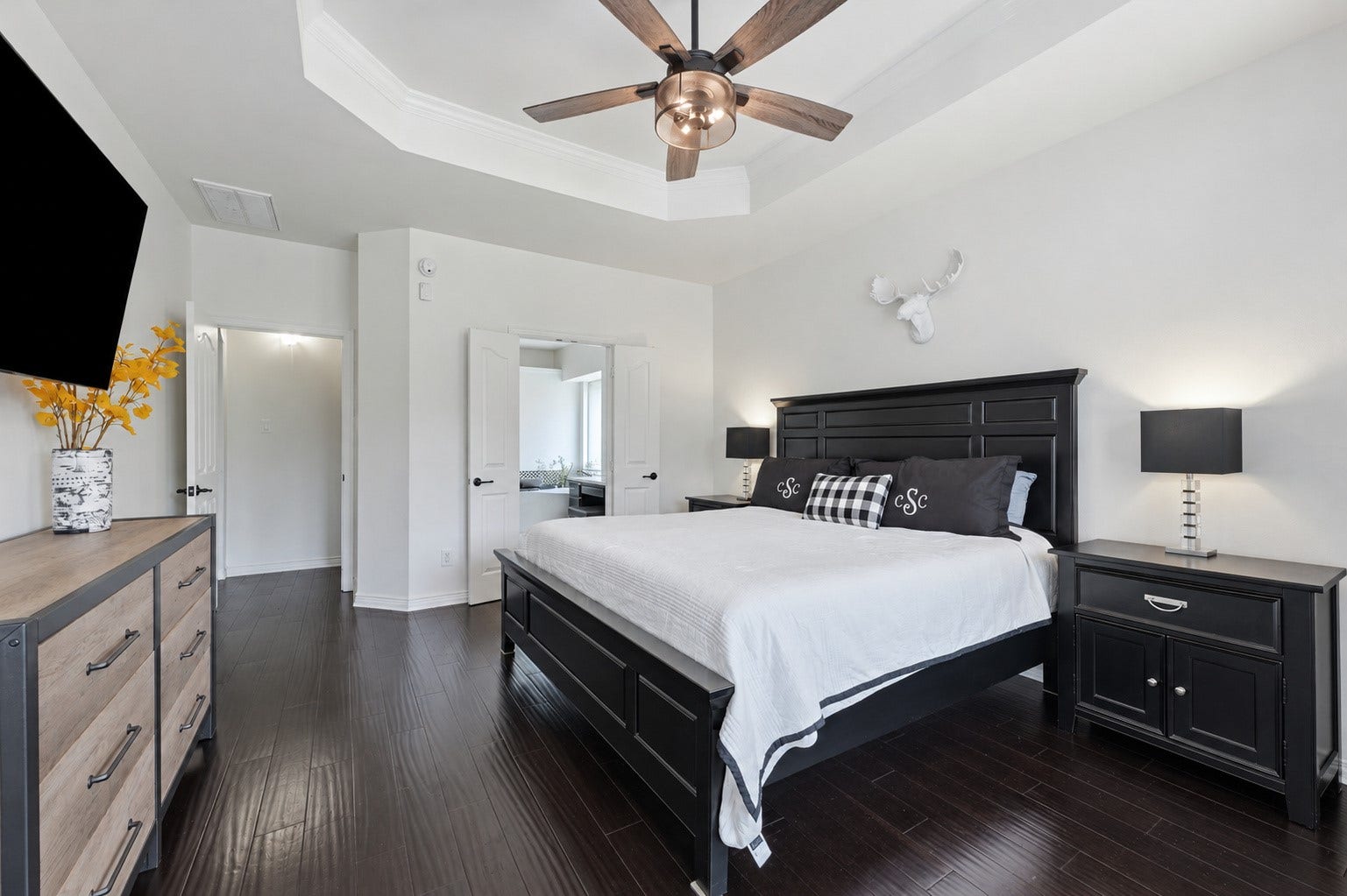 Large primary bedroom can fit any sized furniture