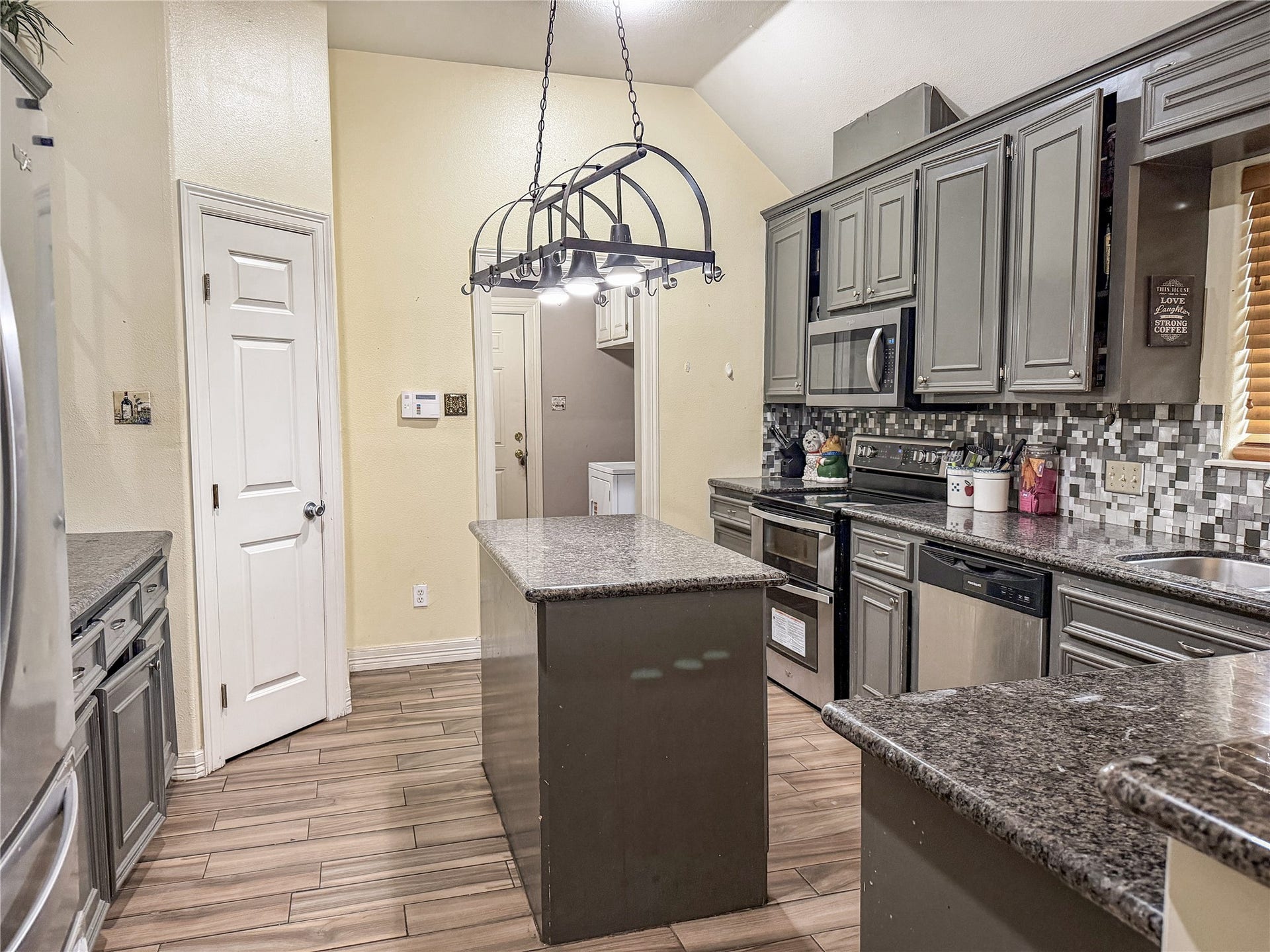 134 Dove Trail, Richwood, TX 77531 Spacious kitchen featuring ample cabinetry, generous counter space, and a functional layout for everyday use.