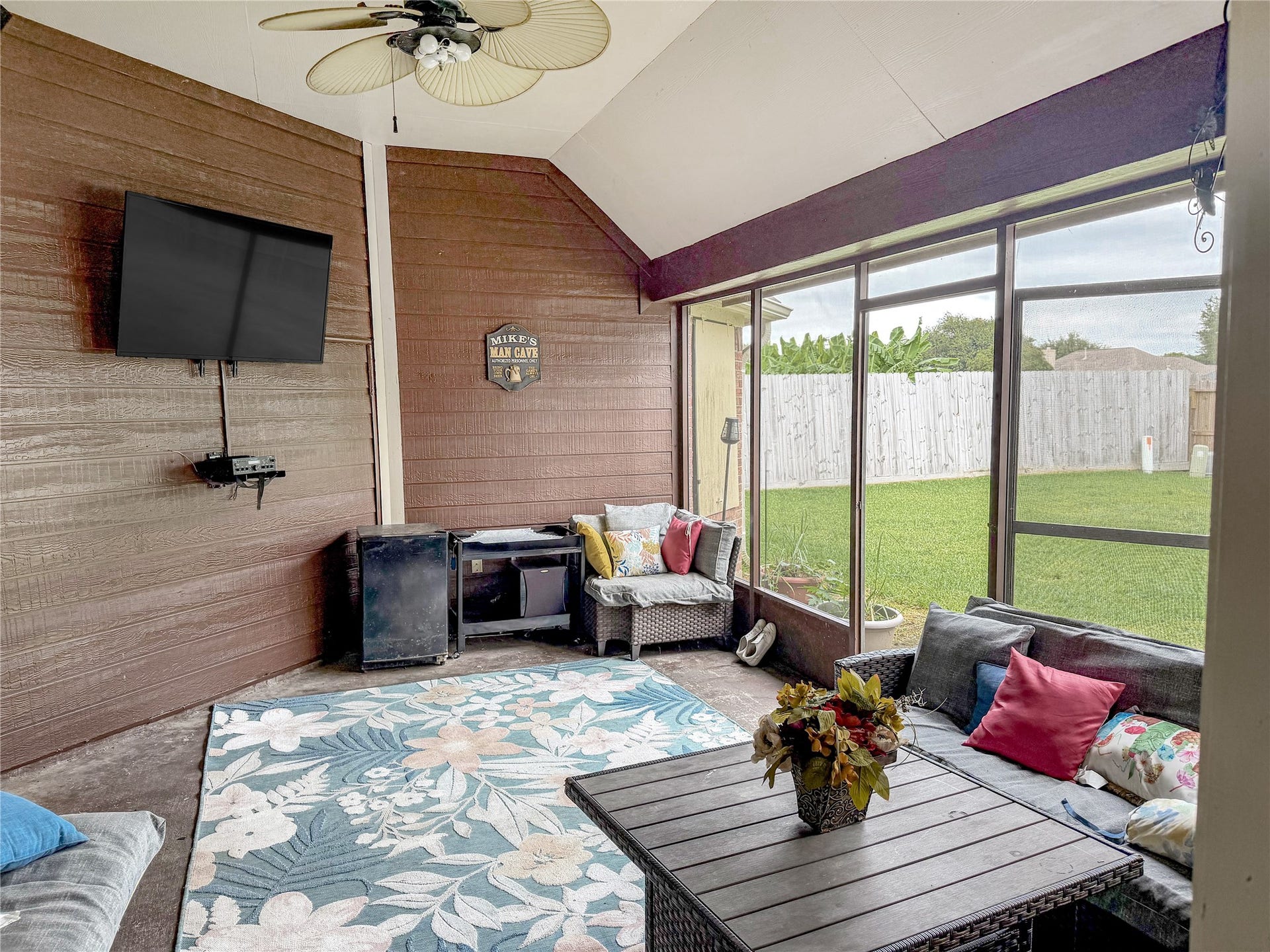 134 Dove Trail, Richwood, TX 77531 Screened-in back patio offering a comfortable outdoor living space with added protection from the elements.