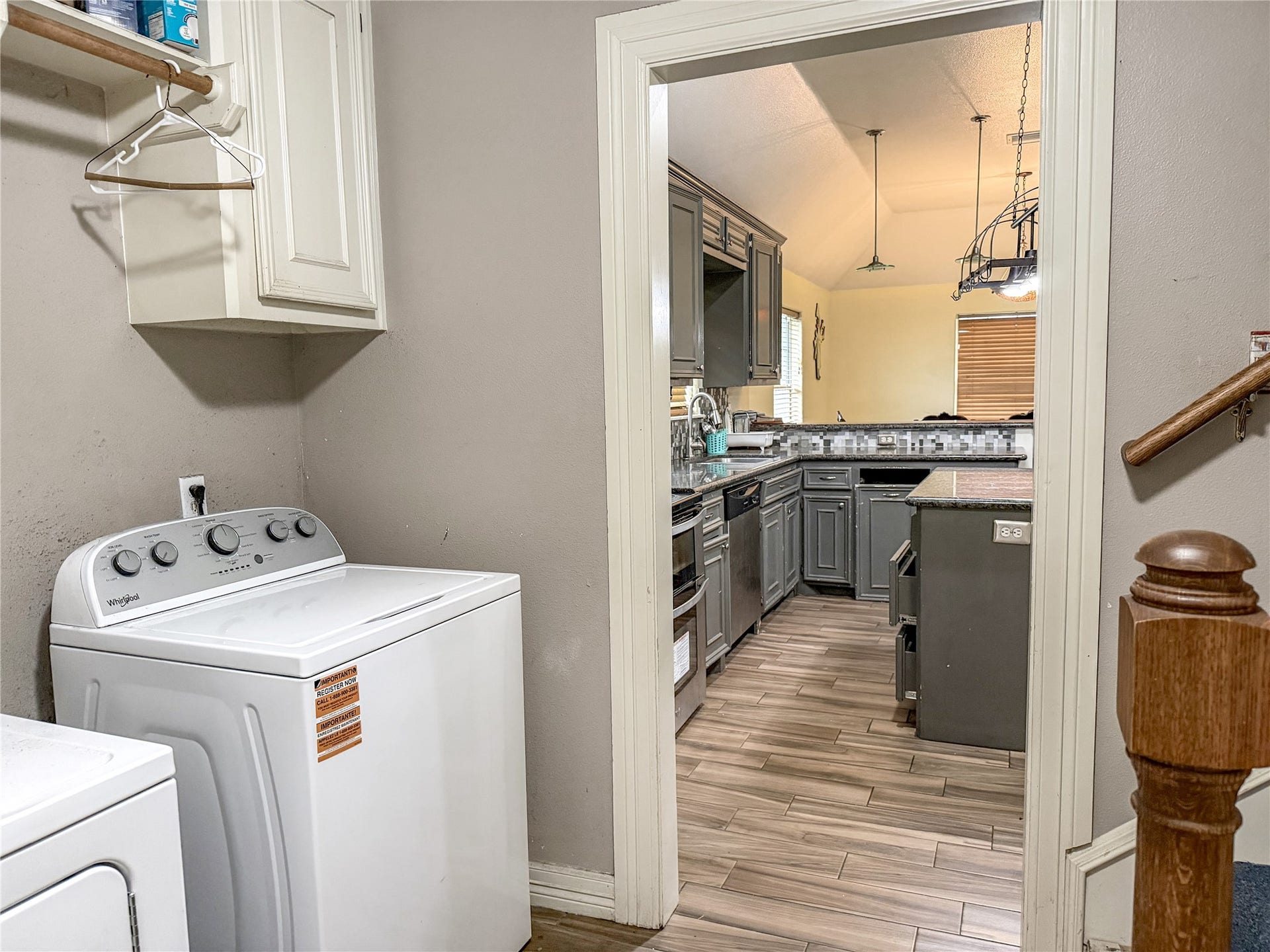 134 Dove Trail, Richwood, TX 77531 Pass-through laundry room conveniently located between the garage and kitchen, offering easy access and a functional transition into the home.