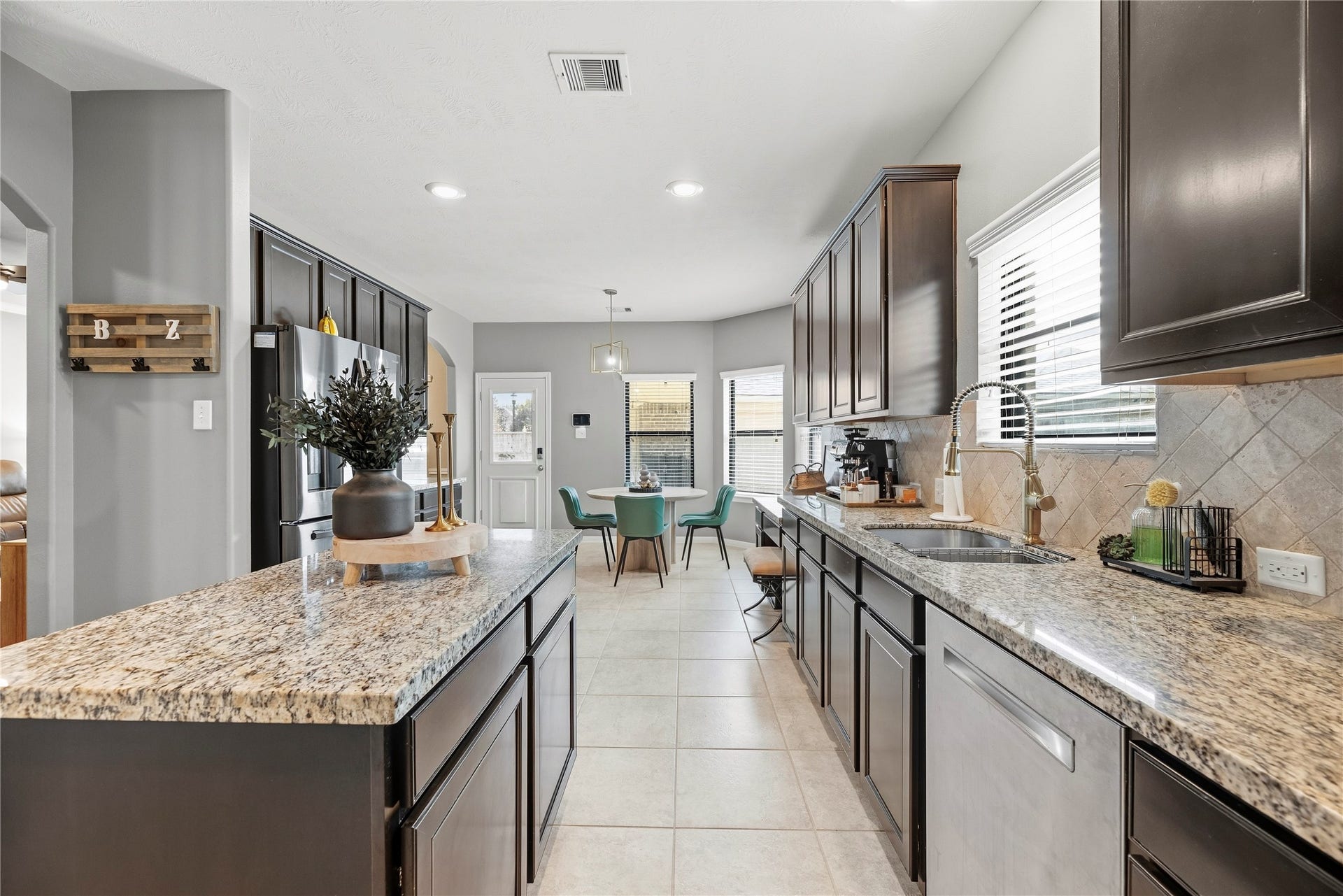 26819 Rockwood Park Lane, Cypress, TX 77433 Another view of the kitchen with plenty of storage and counter space.