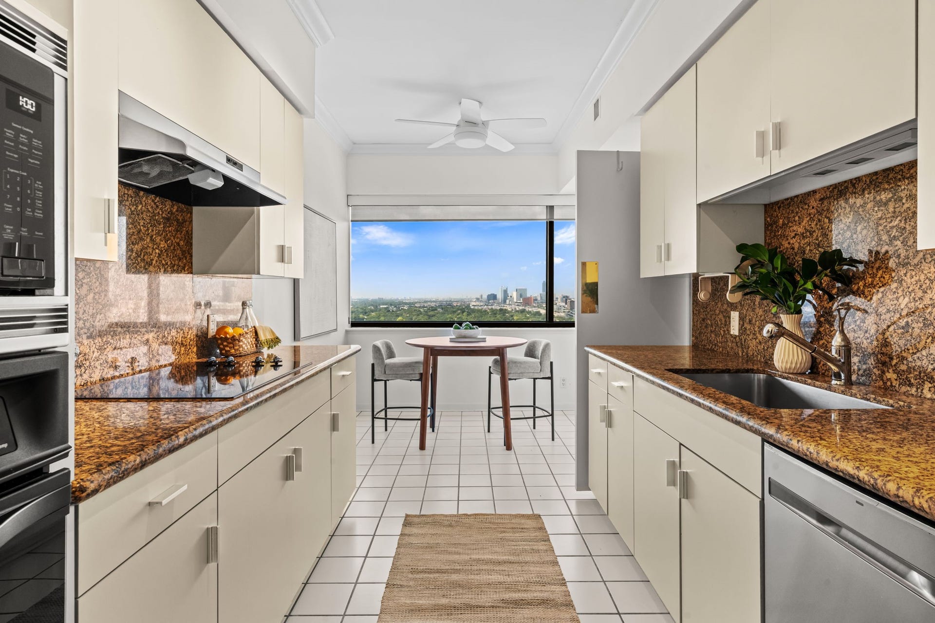 This kitchen view highlights the abundant storage and long stretches of counter space.