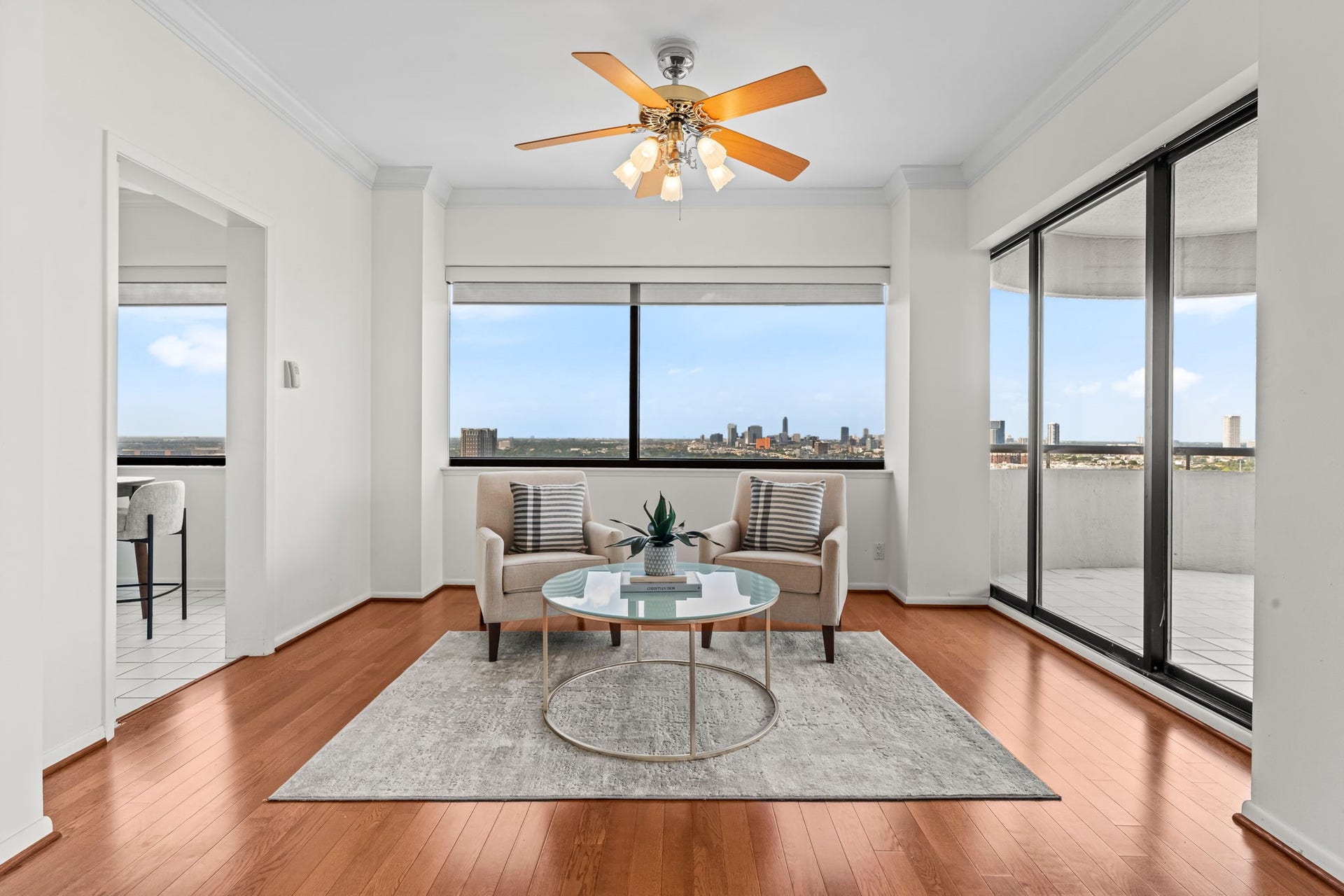 Sunroom. Elevated views provide a memorable sense of place from morning through evening.