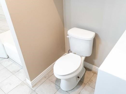 A convenient little half bath, right where you need it.