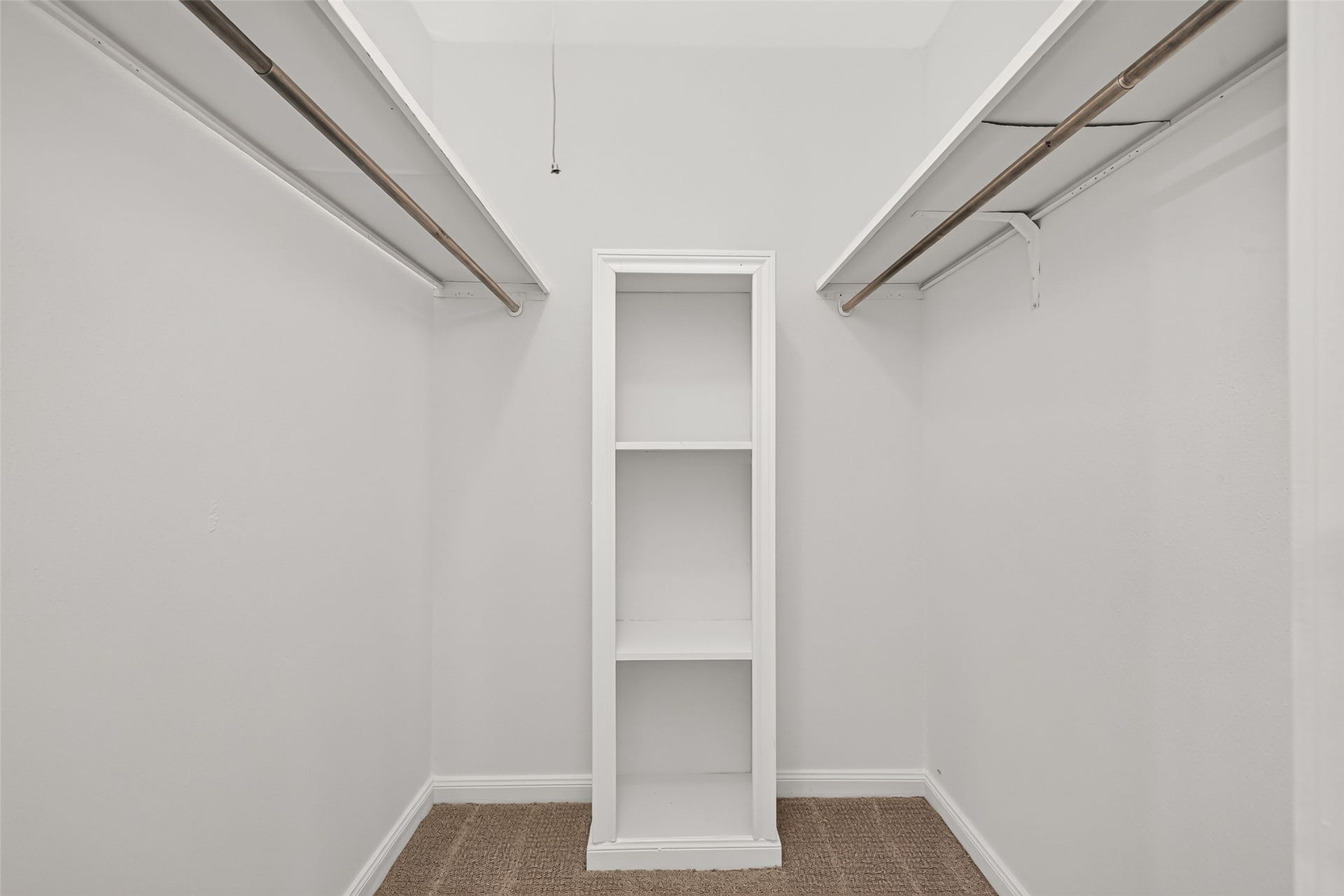 7602 Salge Drive, Houston, TX 77040 Spacious primary walk-in closet featuring a practical layout with plenty of room for clothing, shoes, and accessories.