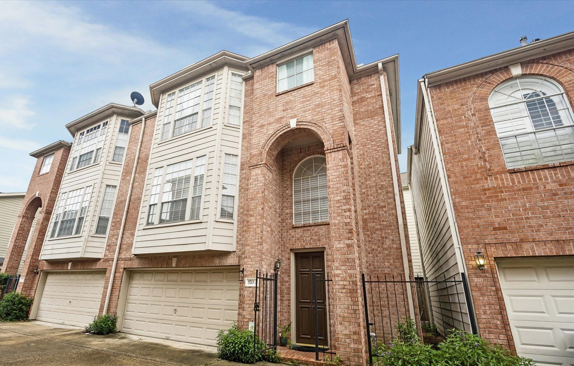 5213 Blossom Street, #A, Houston, TX 77007 Attractive brick facade; gated front door & attached on only 1 side