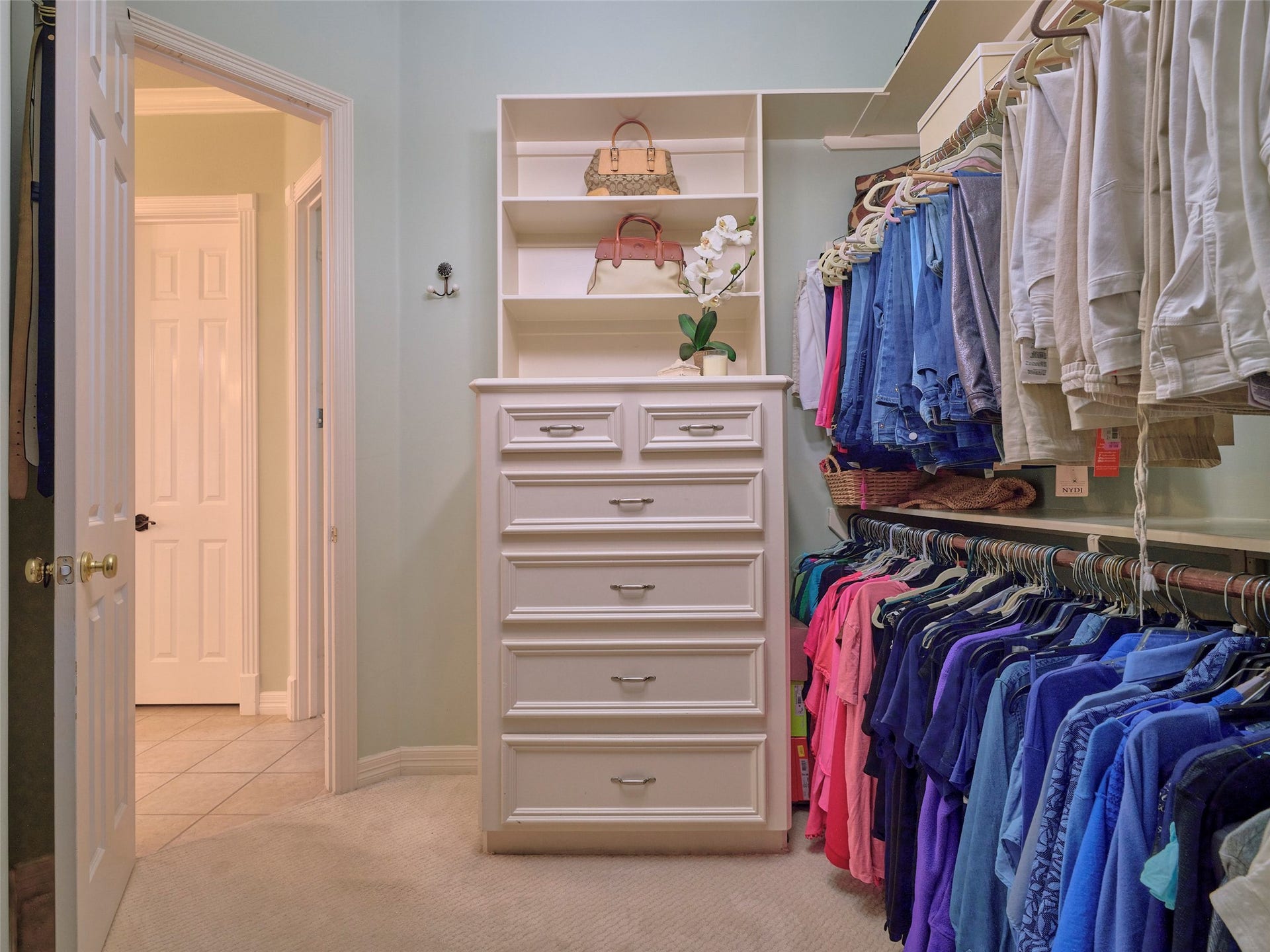 7111 Mohave Hills, Houston, TX 77069 Two oversized walk in closets with additional custom cabinetry