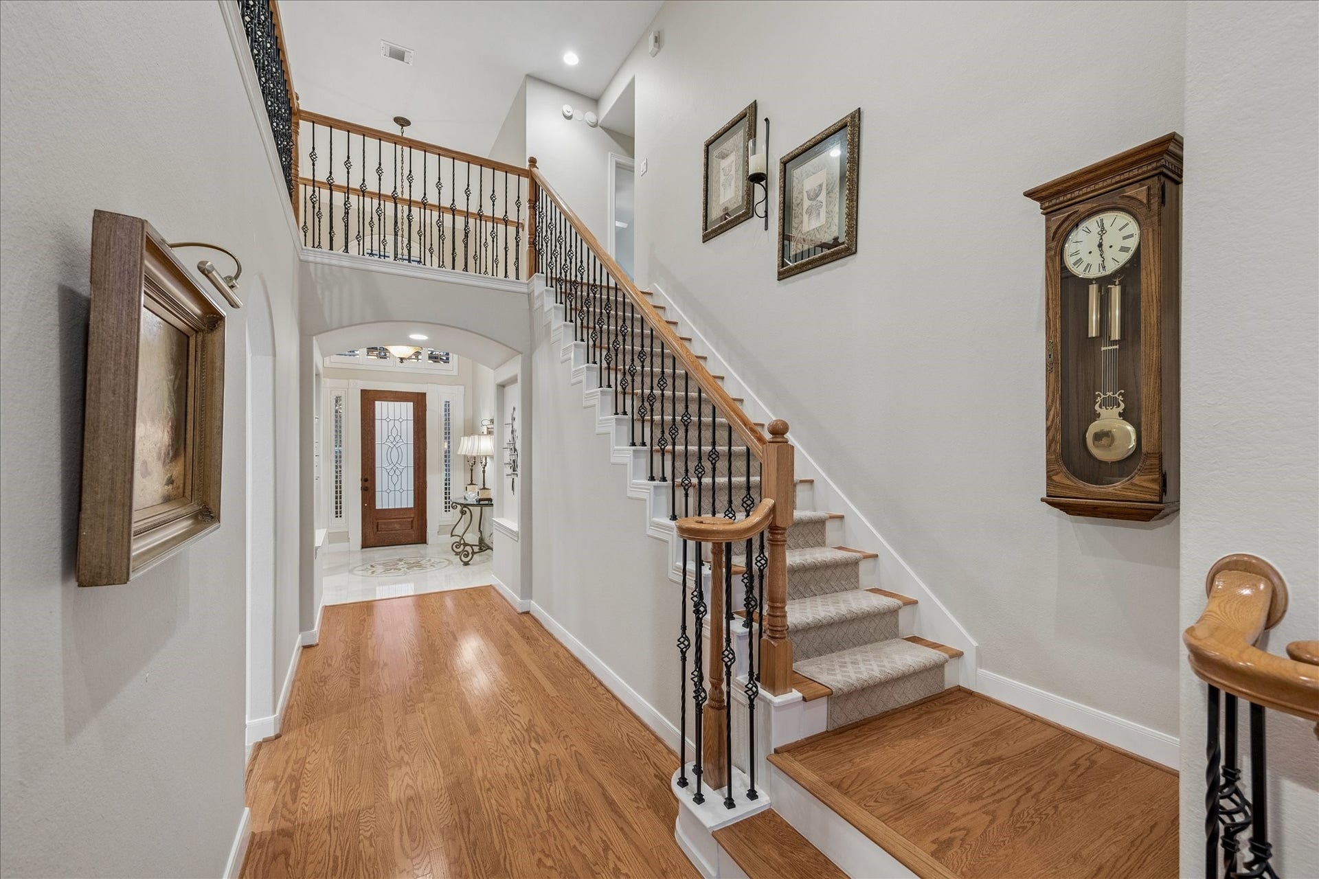 This home is designed for seamless connection, and as you head upstairs, the open catwalk offers a beautiful view overlooking the foyer below.
