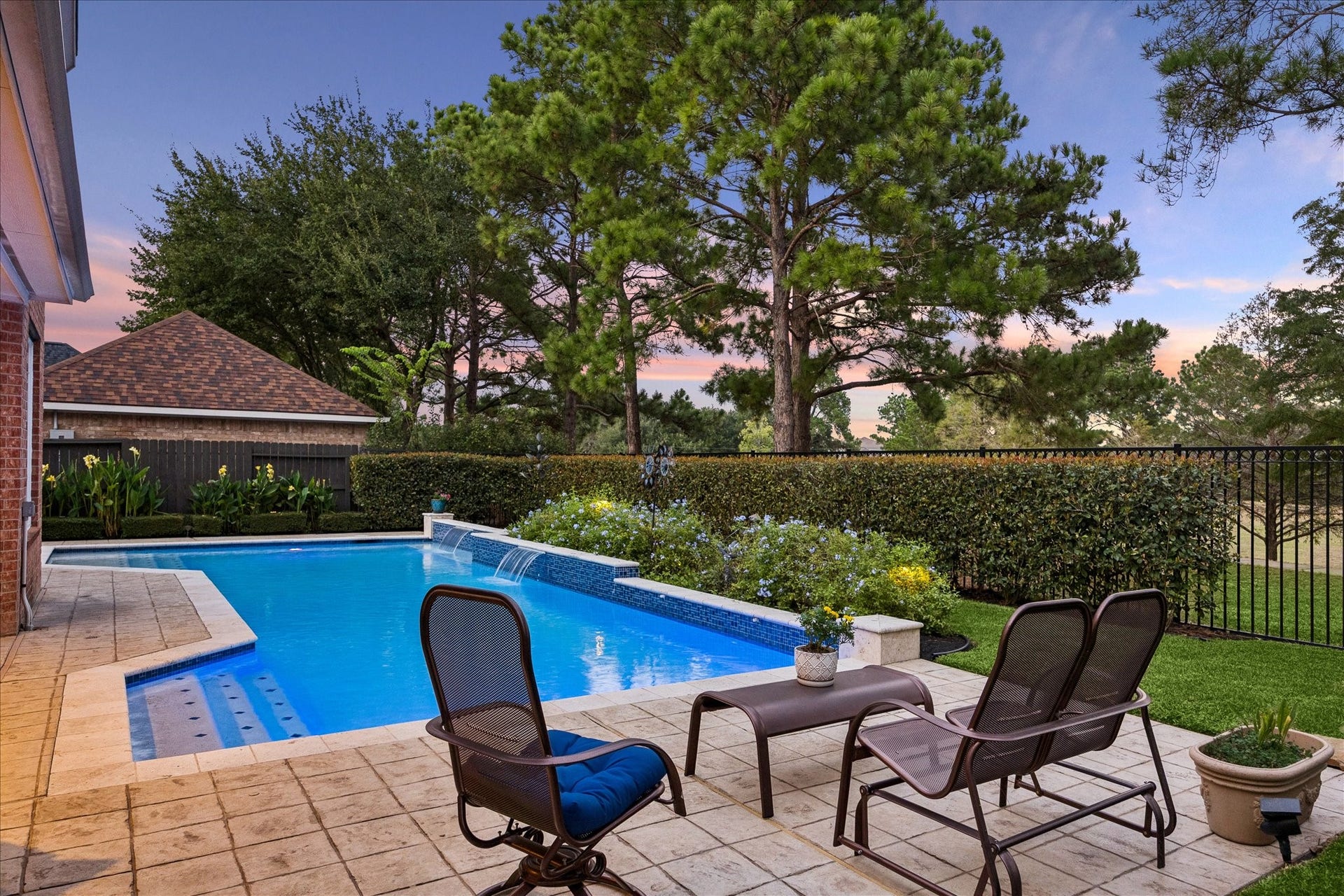 Fabulous private backyard featuring a sparkling pool with gate access to the greenbelt walking trail.