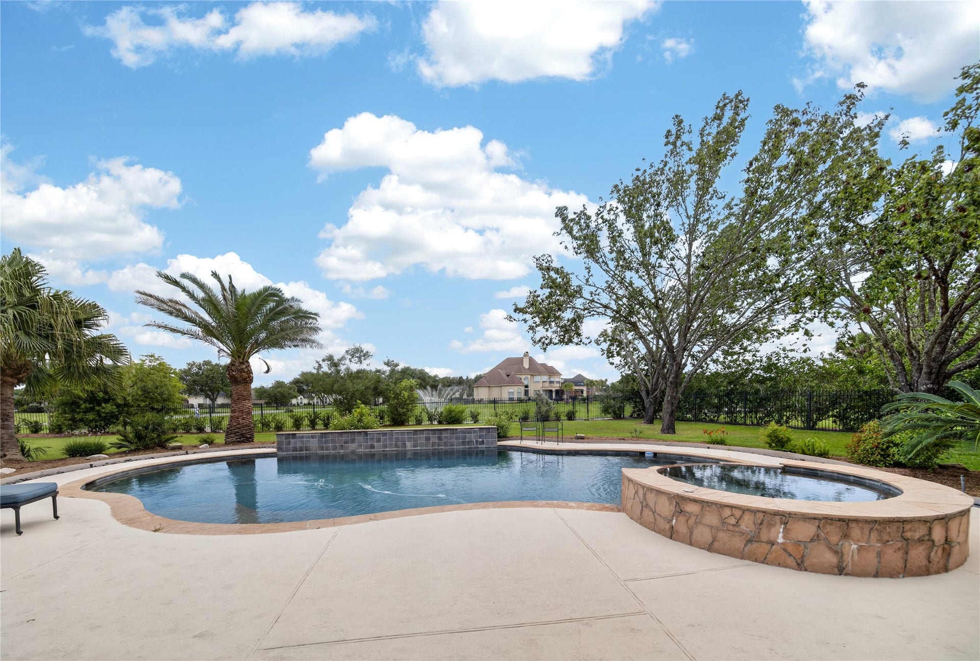 8826 Crown Jewel Drive, Richmond, TX 77469 Have an oasis escape everyday with your Caribbean-inspired backyard! Boasting a sparkling swimming pool and spa, parties and get-togethers are sure to include floaties, pool noodles, and inflatable flamingos!
