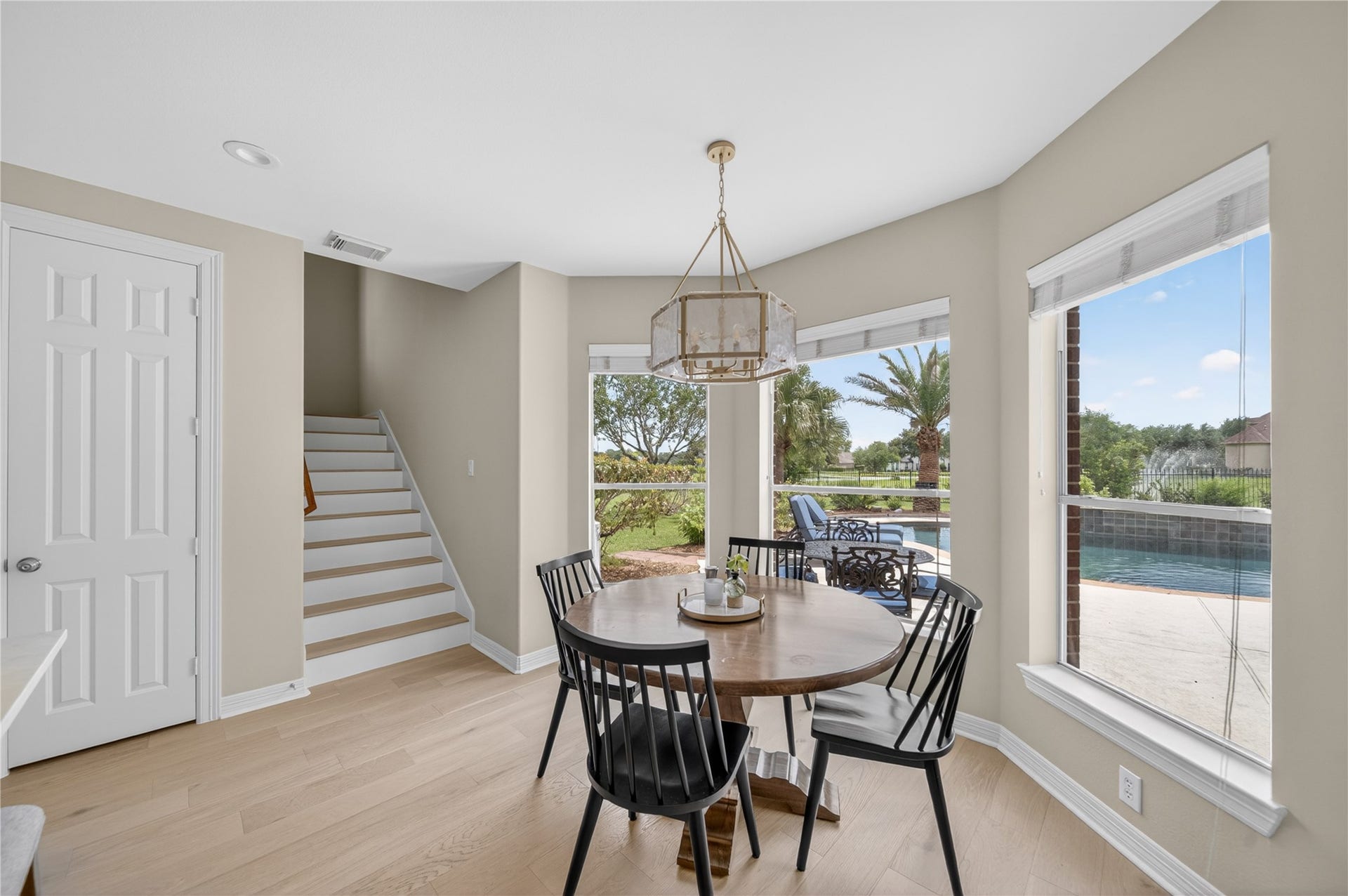 8826 Crown Jewel Drive, Richmond, TX 77469 Everyday dining is stylish and bright in the breakfast area. Eat heart-shaped waffles and sausage with the kiddos, as you admire the view of the oasis backyard!