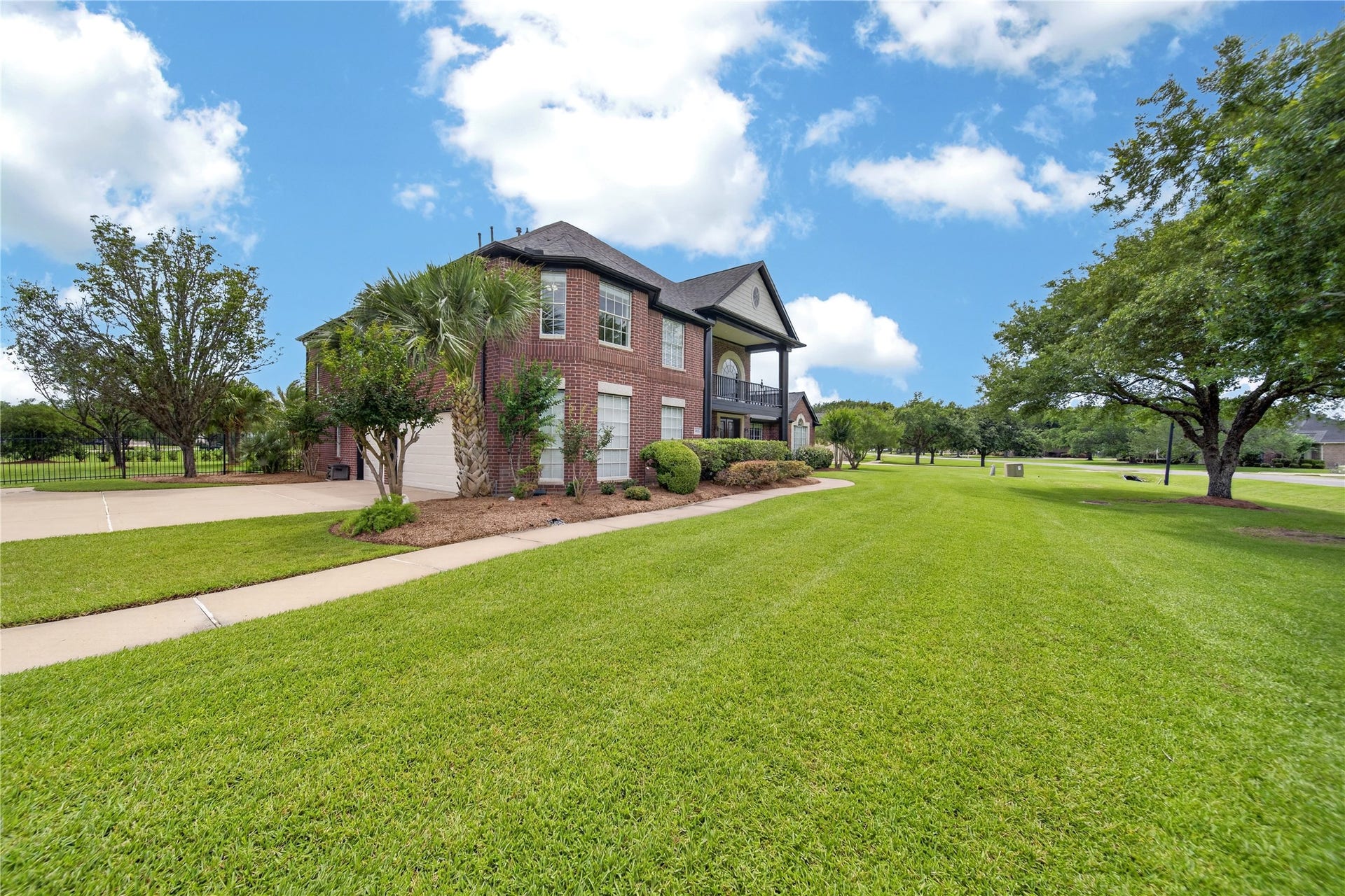 8826 Crown Jewel Drive, Richmond, TX 77469 Nestled on a spacious corner lot, this elegant brick home offers abundant natural light and lush surroundings, perfect for your dream lifestyle.