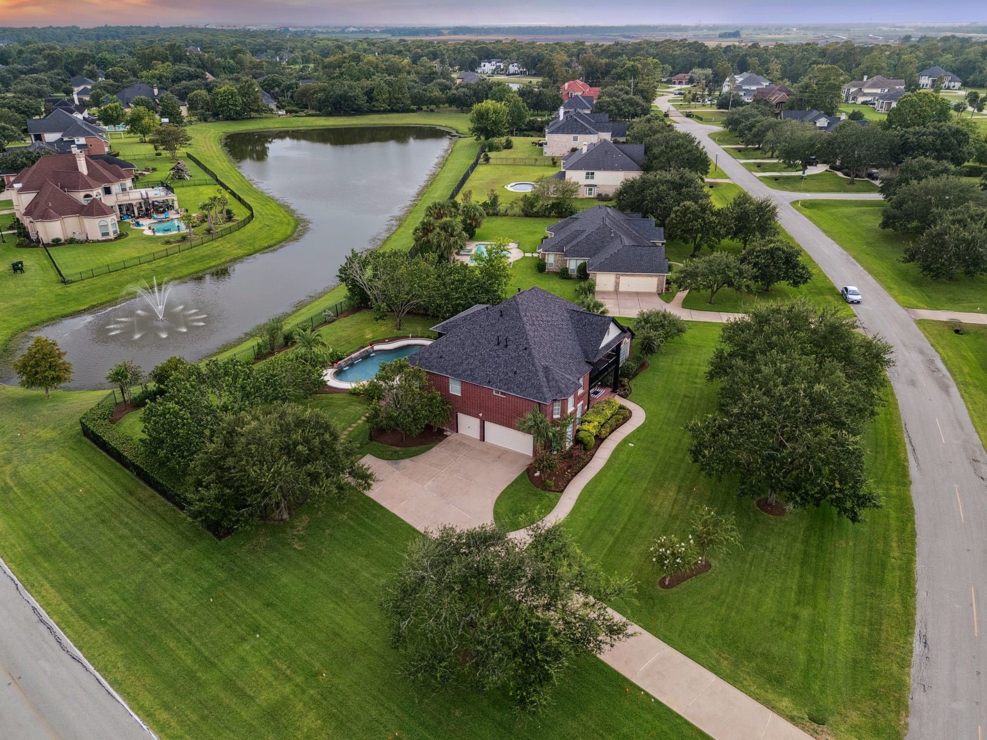 8826 Crown Jewel Drive, Richmond, TX 77469 Nestled in a serene neighborhood with lush green surroundings and picturesque ponds, this elegant home offers peace of mind with a reliable generator, ensuring comfort and security in any weather.