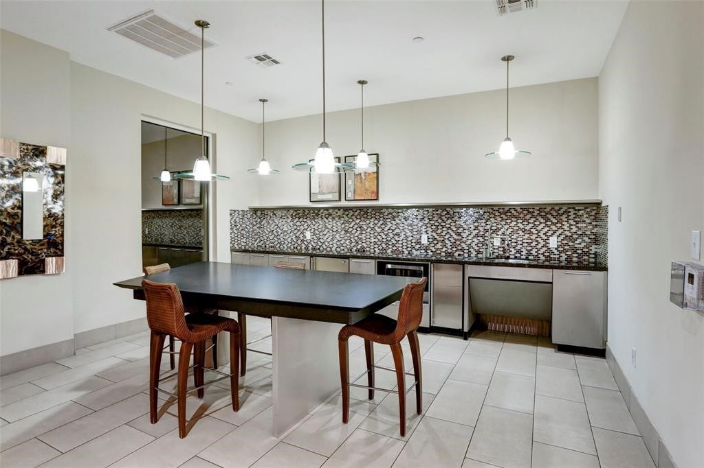 300 St Joseph Parkway, #212, Houston, TX 77002 Gathering, Serving, Kitchenette area.