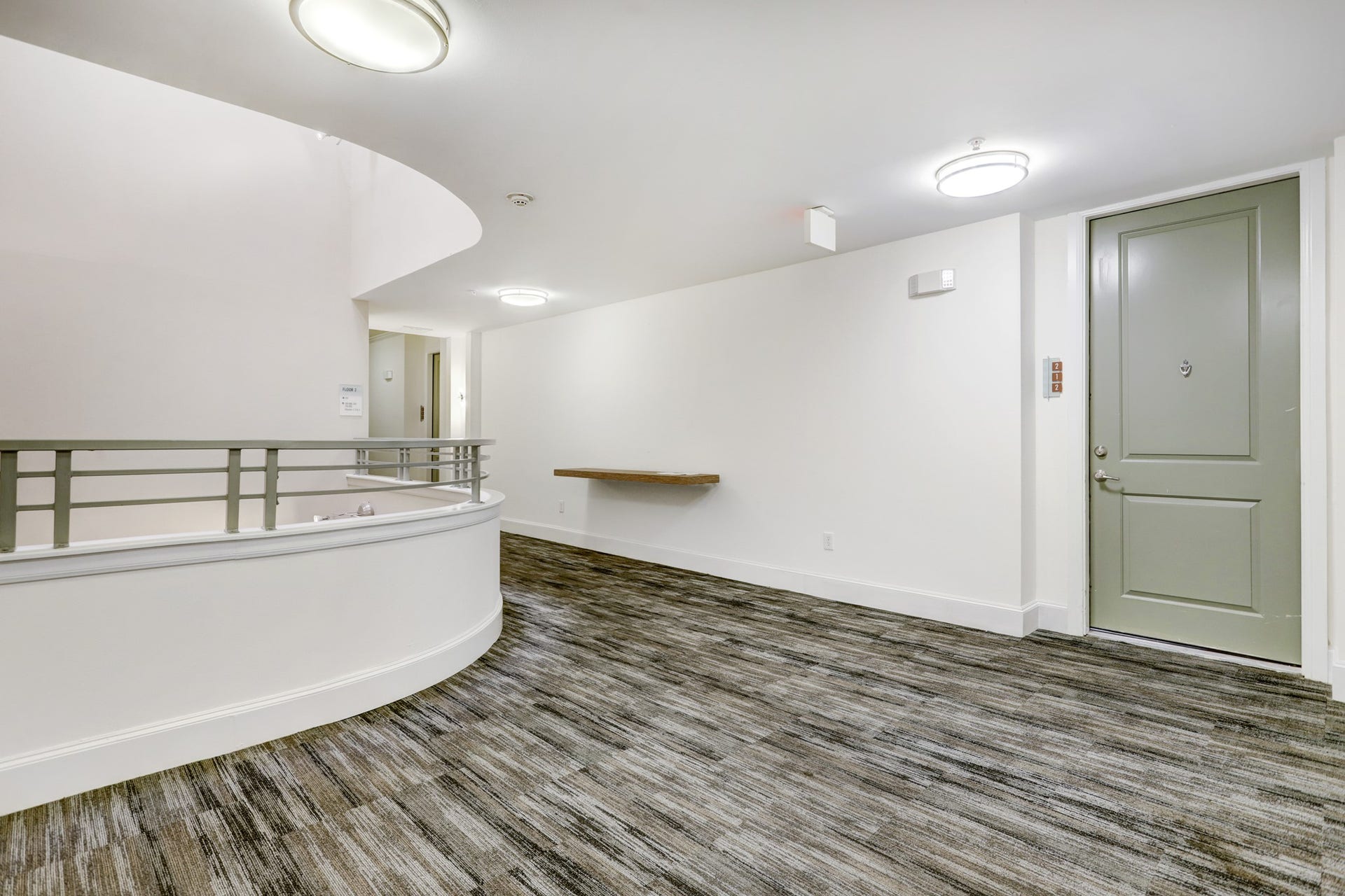 300 St Joseph Parkway, #212, Houston, TX 77002 The Front Door to #212 opens to an impressive indoor atrium!