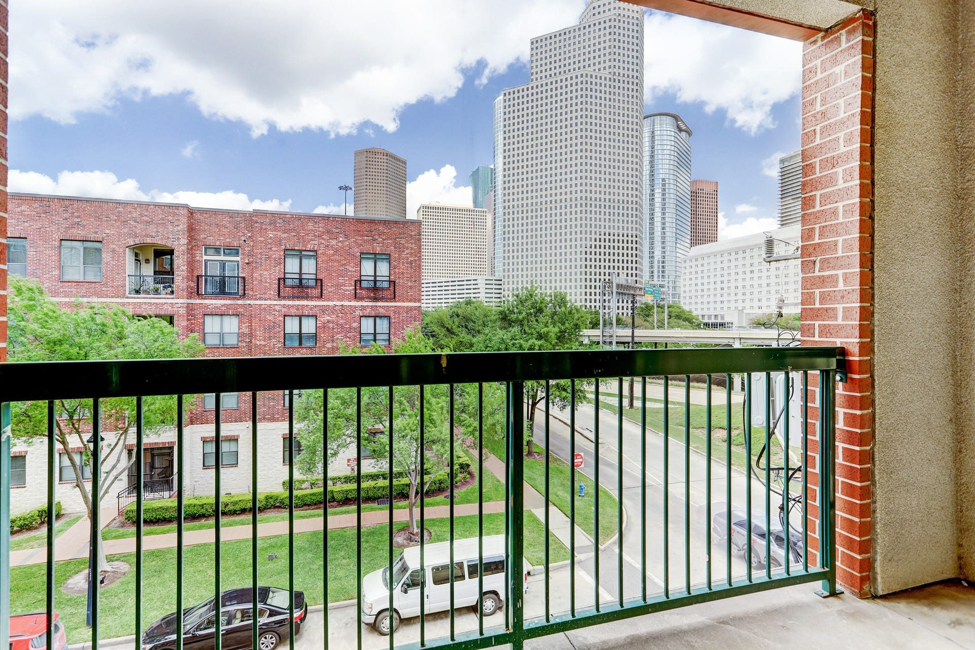 300 St Joseph Parkway, #212, Houston, TX 77002 Looking towards Downtown from the balcony.
