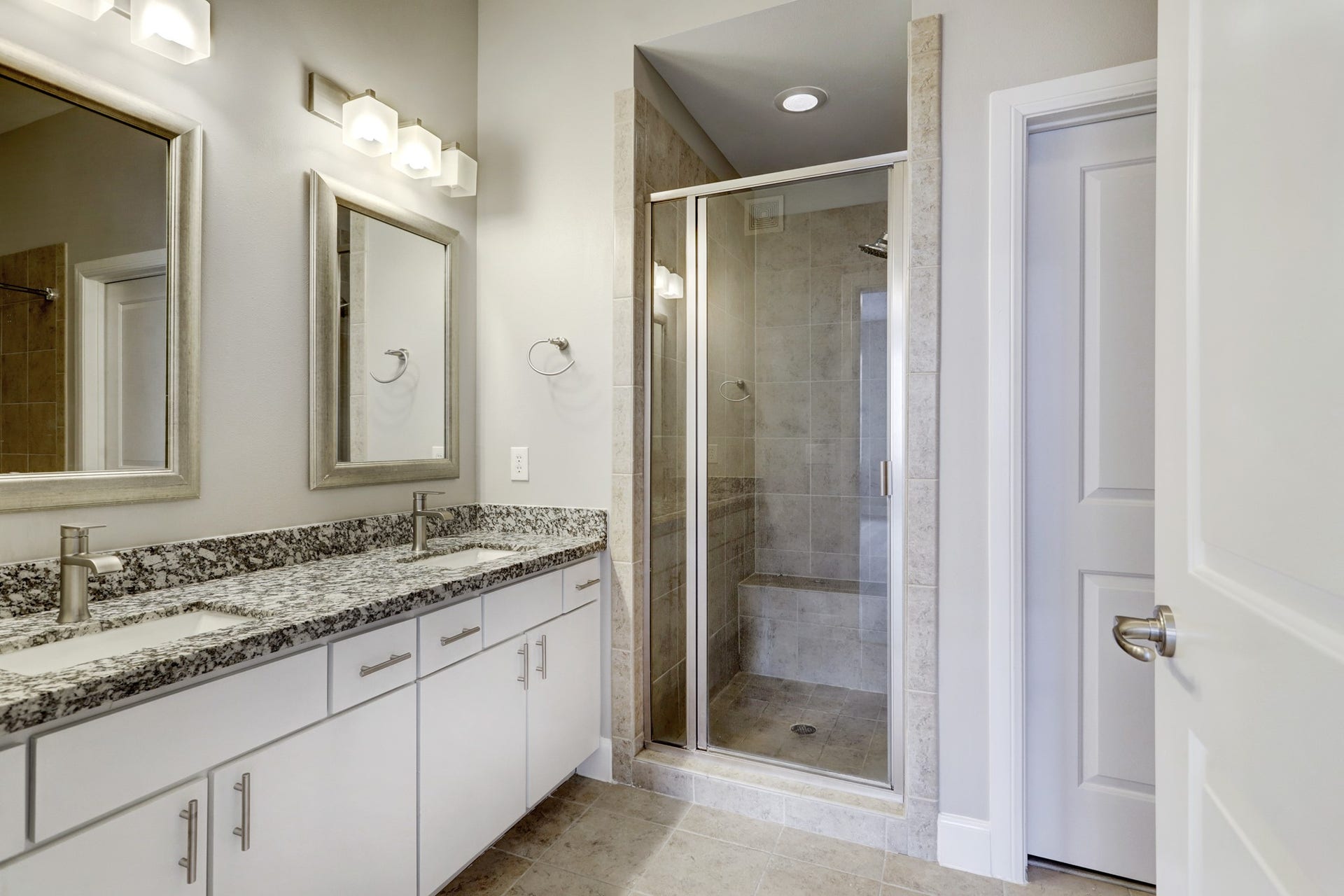 300 St Joseph Parkway, #212, Houston, TX 77002 The Primary Bathroom has double vanities, a separate shower, and...
