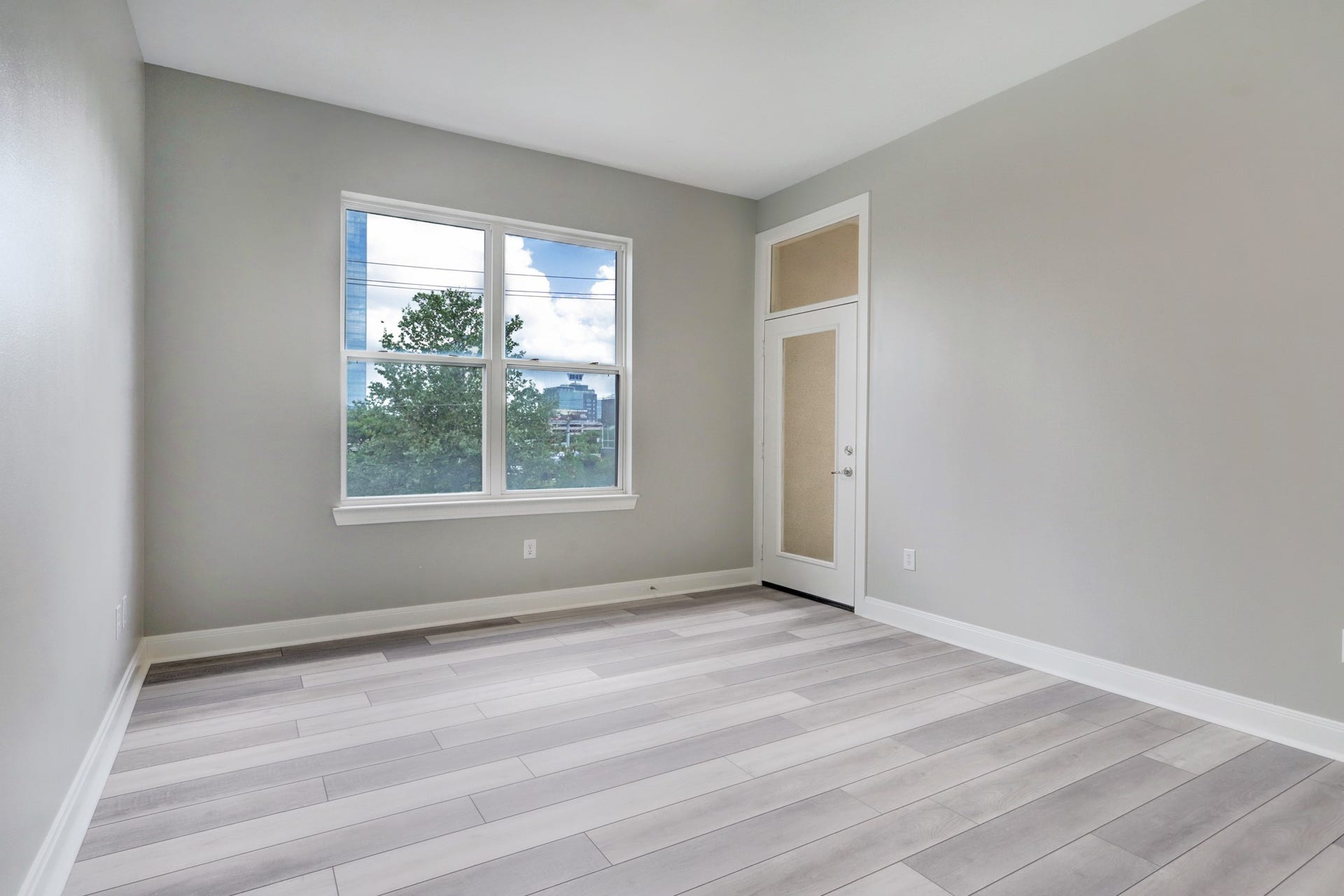 300 St Joseph Parkway, #212, Houston, TX 77002 The Secondary Bedroom is 13x11 and has views onto downtown.