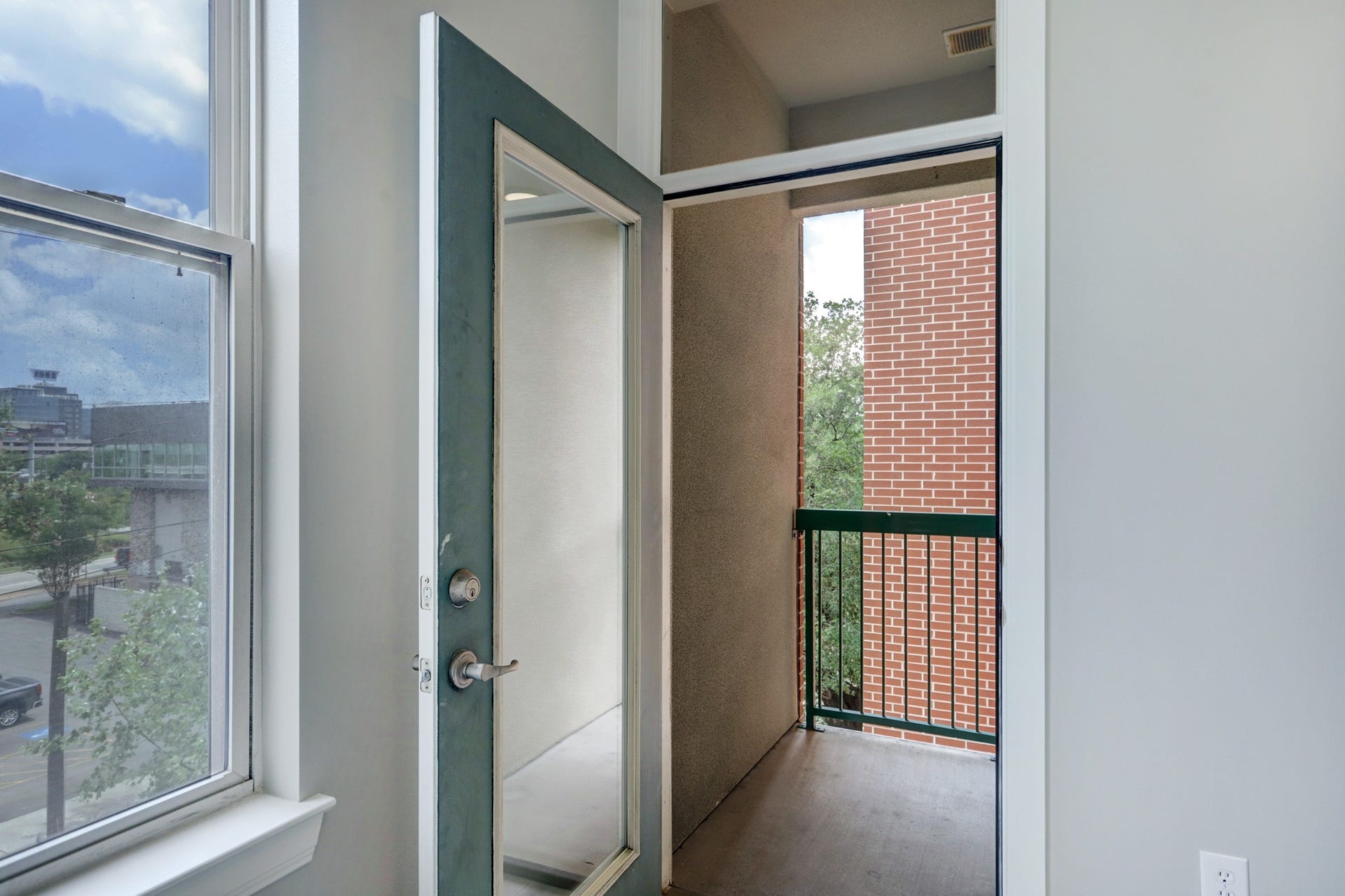 300 St Joseph Parkway, #212, Houston, TX 77002 Plus! The Secondary Bedroom has a private outdoor balcony!