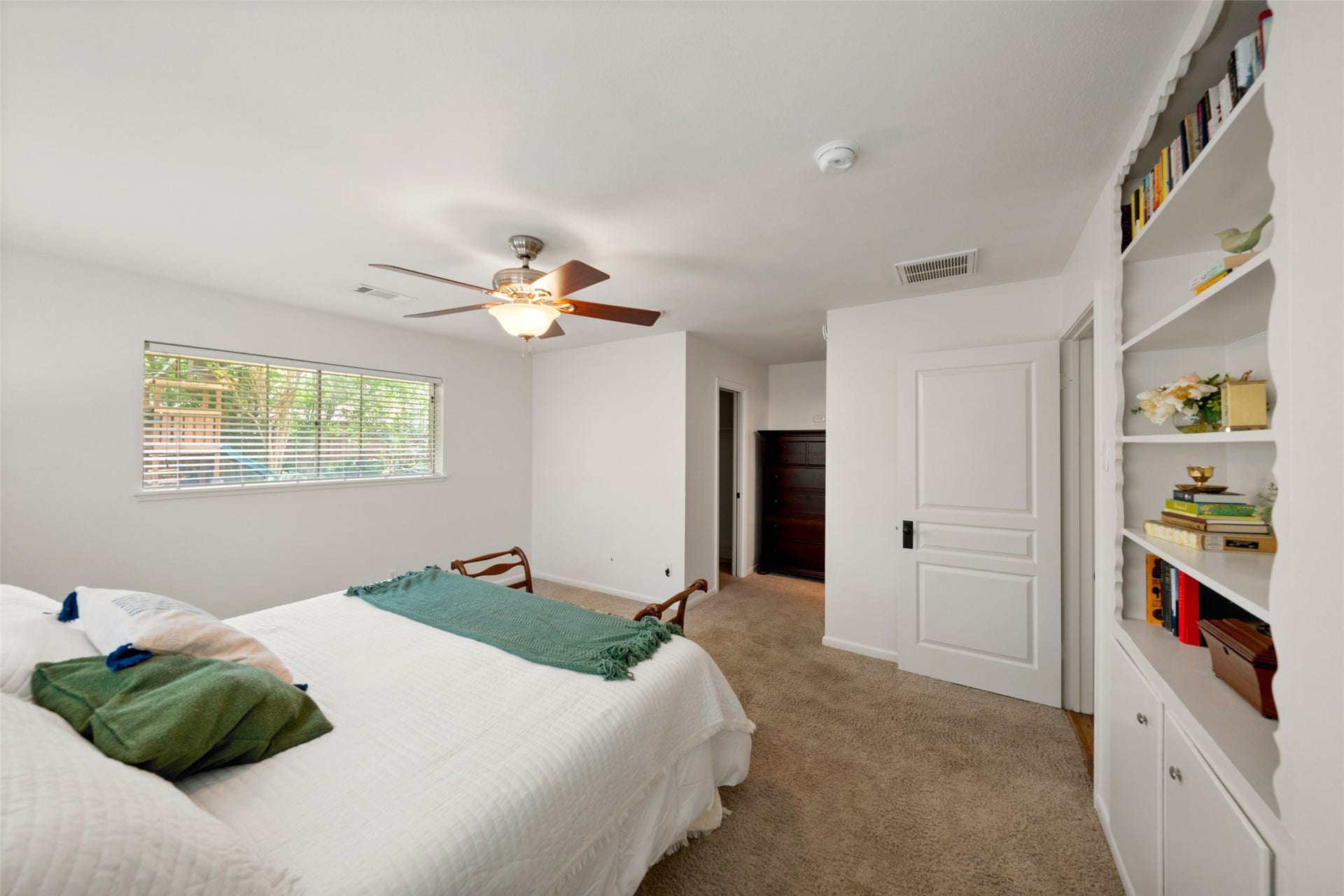 1343 Del Norte Street, Houston, TX 77018 Another view of the spacious primary suite highlights built-in shelving and storage, abundant natural light and the rooms generous proportions.