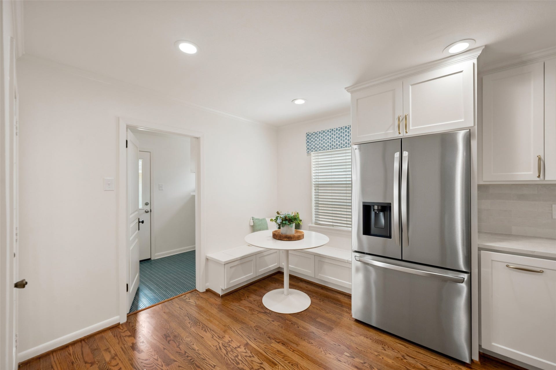 1343 Del Norte Street, Houston, TX 77018 Charming breakfast nook with built-in banquette seating creates a cozy spot for casual dining just off the kitchen.