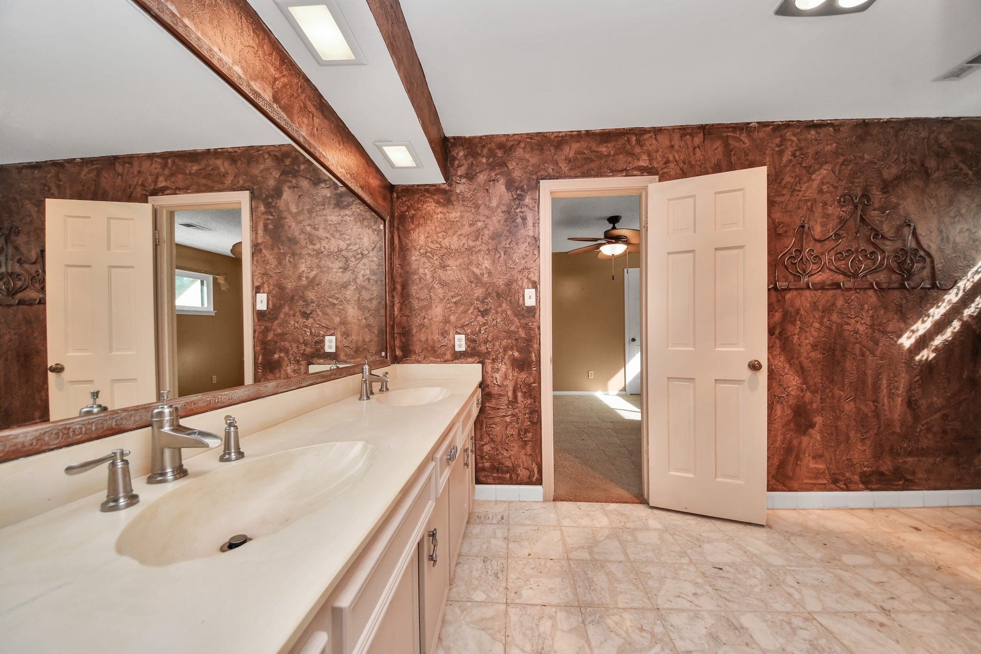 722 Chevy Chase Circle, Sugar Land, TX 77478 Secondary bath up features a long dual-sink vanity and plenty of counter space.