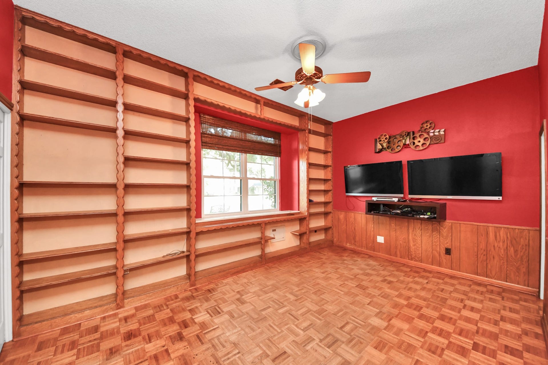 722 Chevy Chase Circle, Sugar Land, TX 77478 Custom built-ins maximize storage and showcase the thoughtful details found throughout the home. This could be play room, media, second bedroom down (it features a closet and access to a full bath!), flex room, you name it.