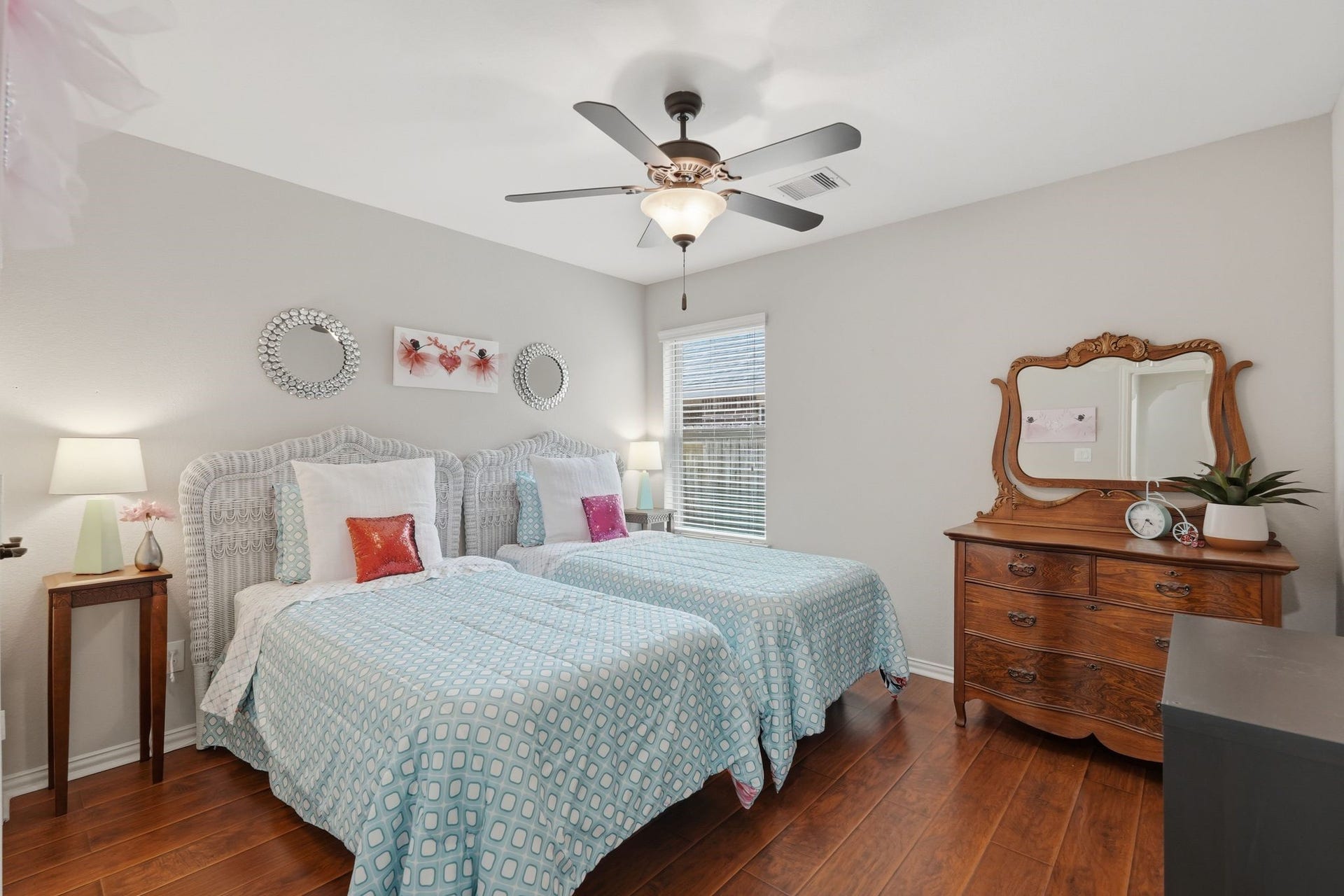 The second bedroom is located just past the laundry room.