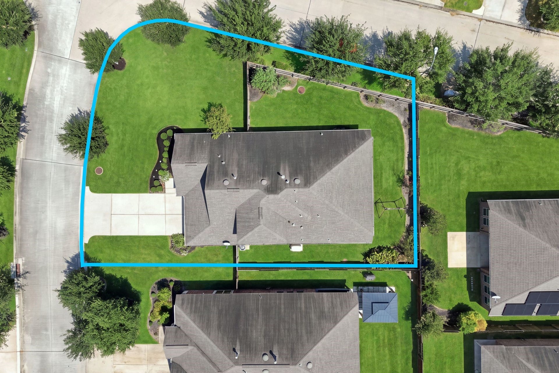 This arial photo shows the spacious corner lot.