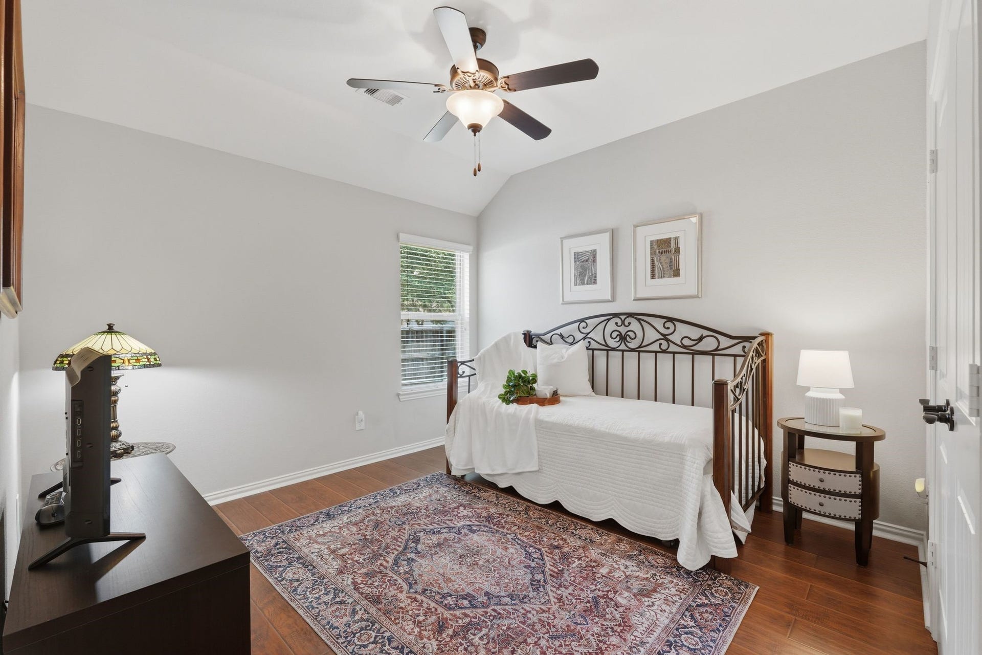 The first bedroom is located near the front of the home, by the bathroom.
