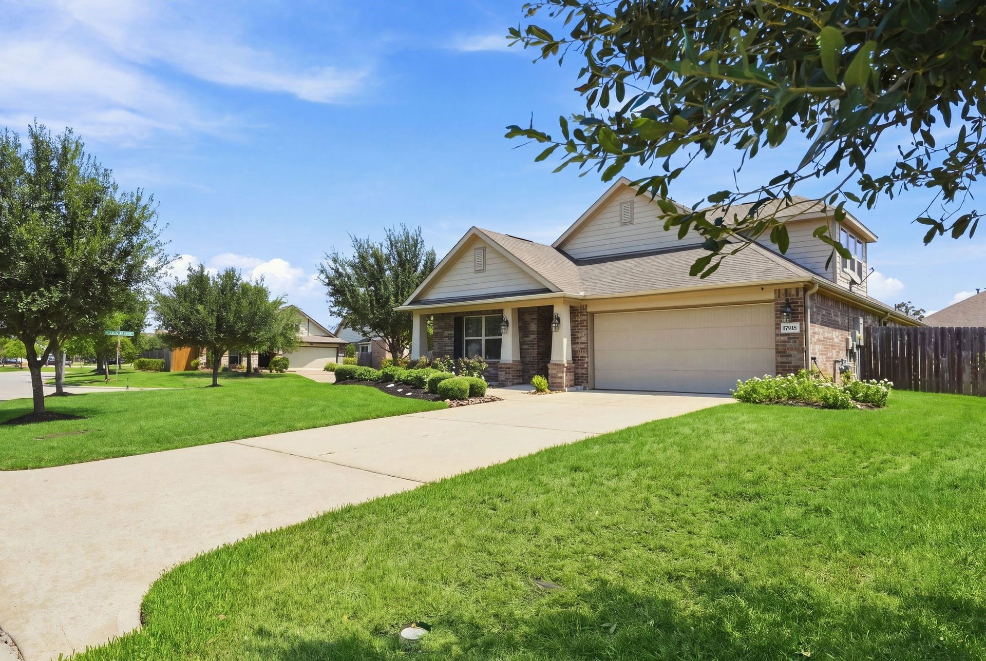 Welcome to 17918 Sulgrave Drive. Double-wide driveway makes guest and family parking so much easier!