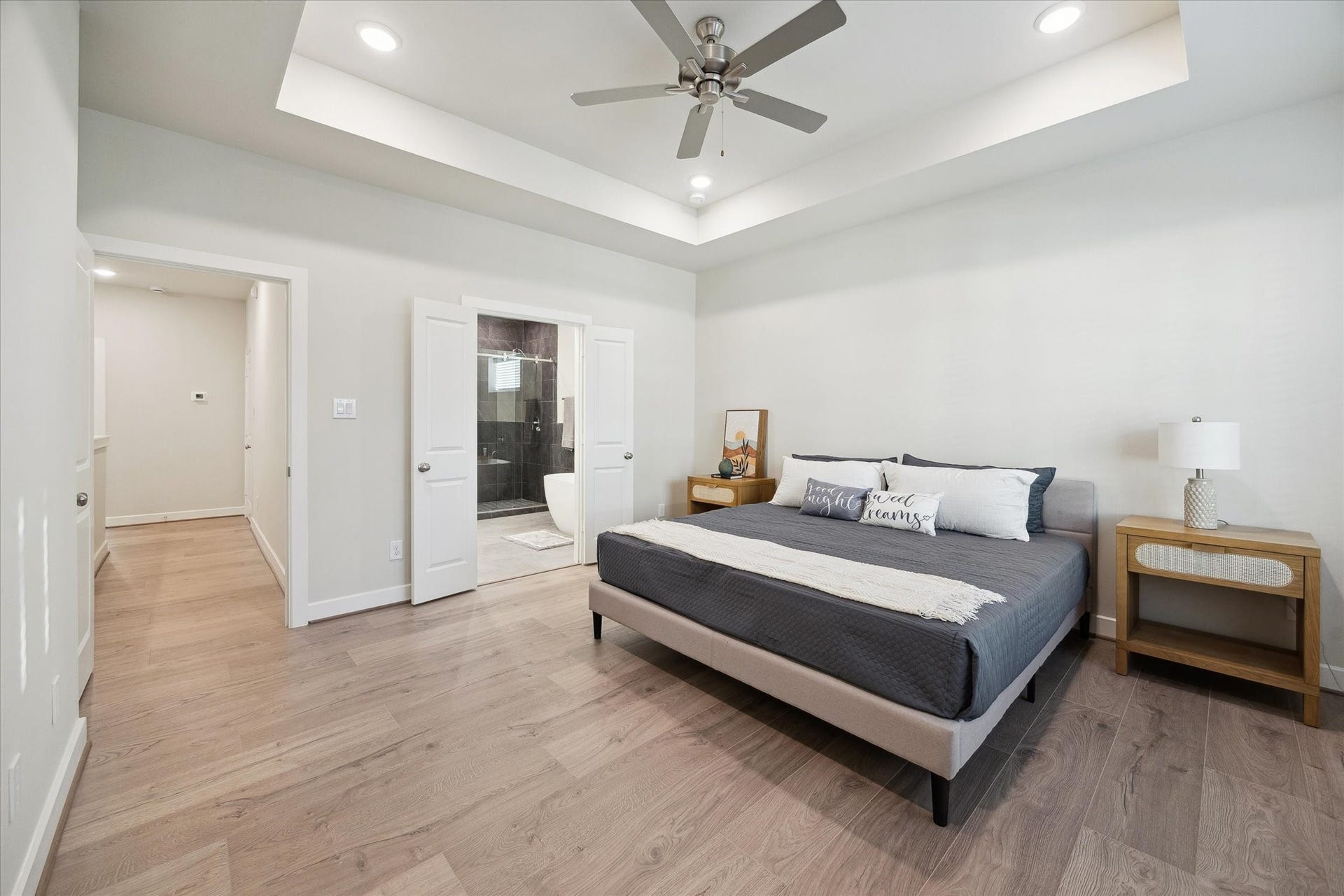 Representative photo showing the communitys model home primary bedroom. Layout and selections may vary.