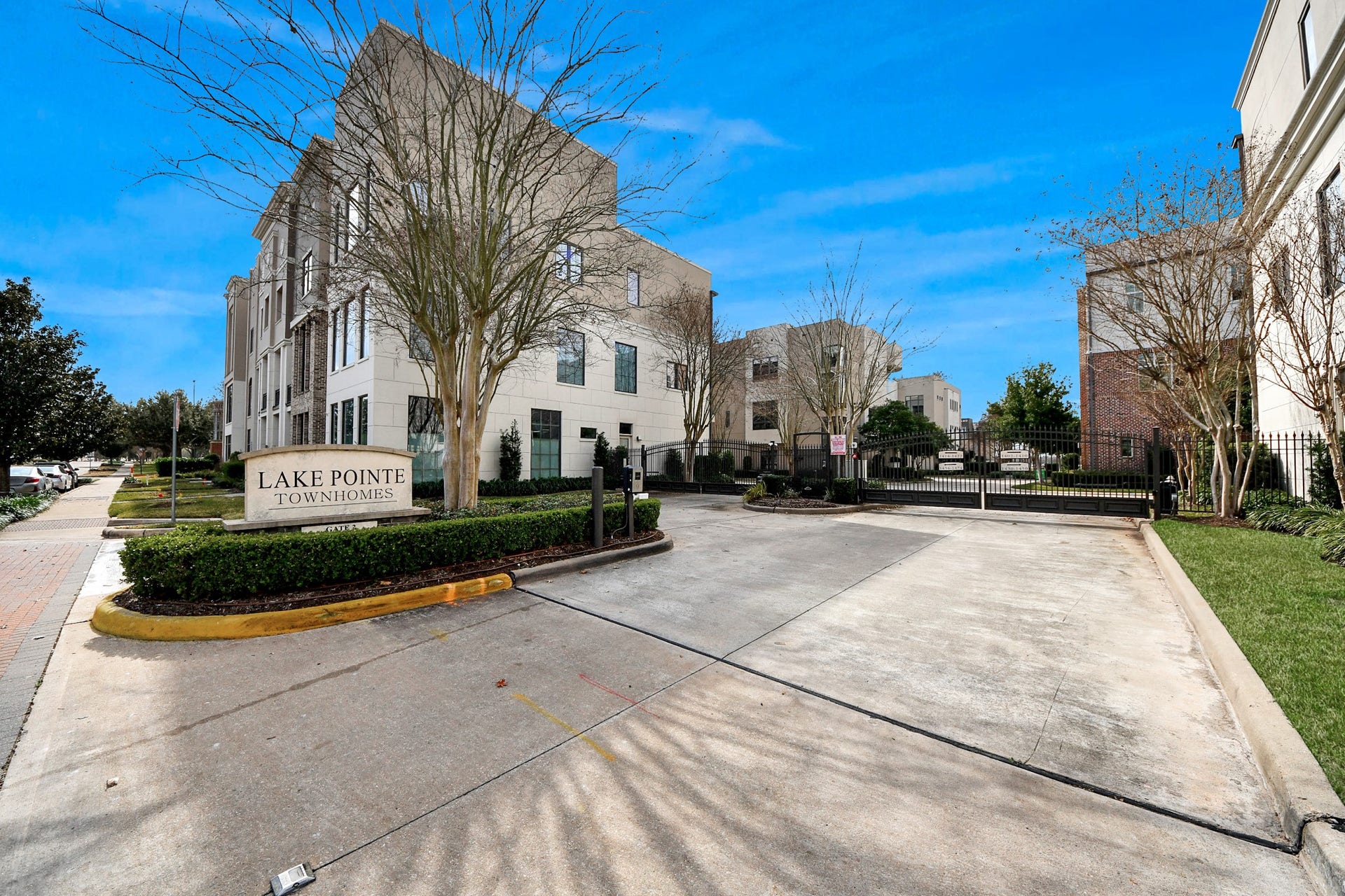 1406 Lake Pointe Parkway, Sugar Land, TX 77478 Lake Pointe is a modern gated enclave defined by pristine streetscapes, manicured grounds, and private garages. Private balconies with outdoor seating create an effortless extension of indoor living, underscoring the lock-and-leave lifestyle.