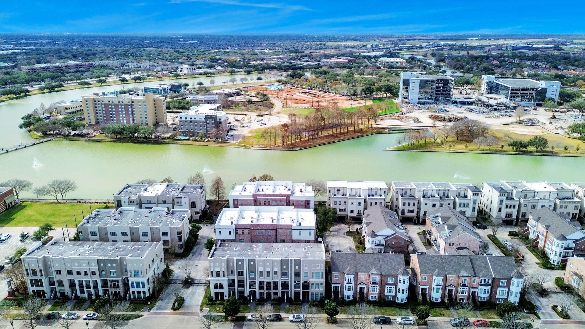 1406 Lake Pointe Parkway, Sugar Land, TX 77478 Aerial view highlighting Lake Pointes premier waterfront setting, just moments from dining, boutique shopping, scenic trails, and year-round community events. A rare blend of walkability, lifestyle, and convenience in one of Sugar Lands most vibrant districts.