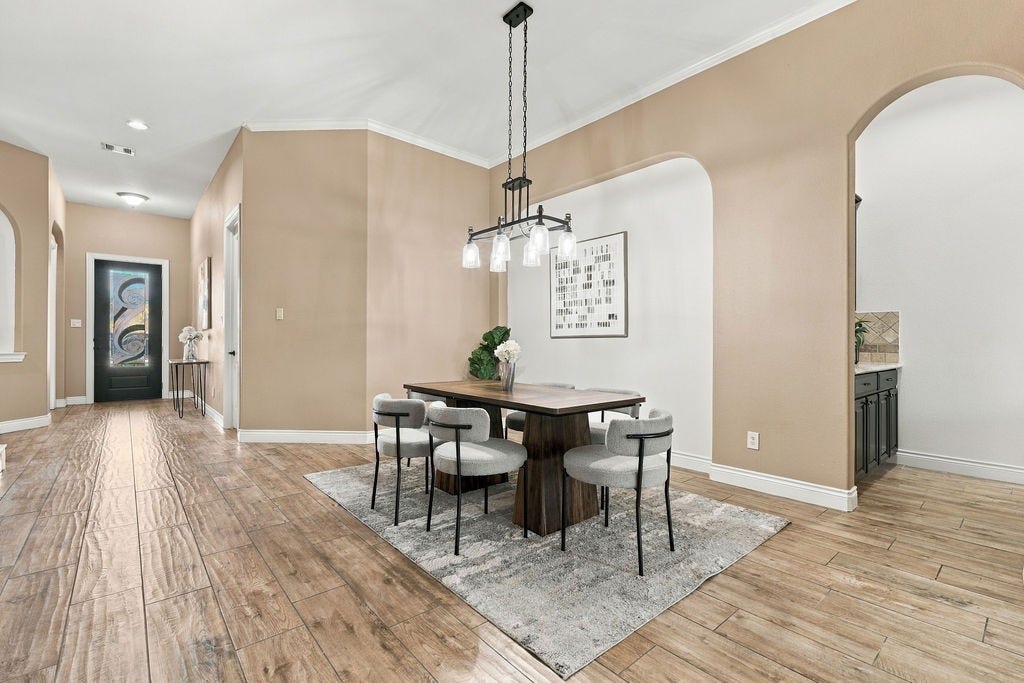 2936 Hawkins Creek Lane, League City, TX 77573 Wonderful dining area that connects with a butler's pantry and the kitchen.