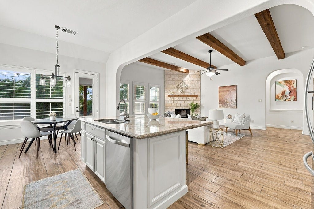 2936 Hawkins Creek Lane, League City, TX 77573 Great view showing how easily the kitchen flows into the casual dining and living areas.